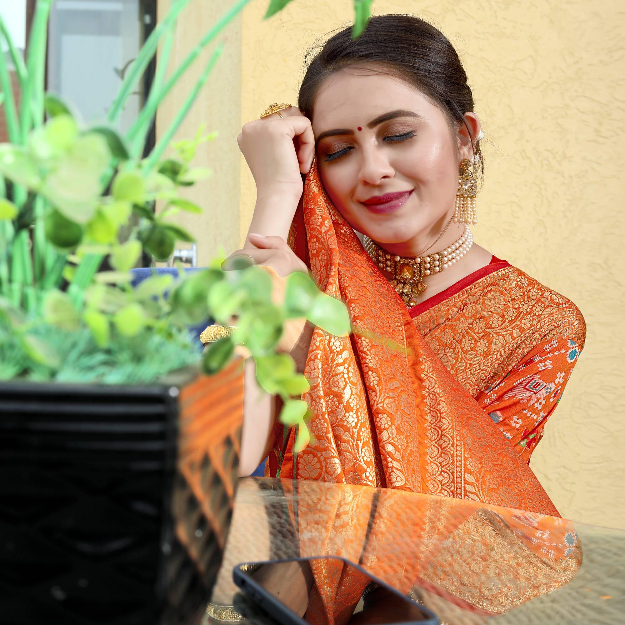 Orange Patola Printed With Woven Border Banarasi Silk Saree - Peachmode