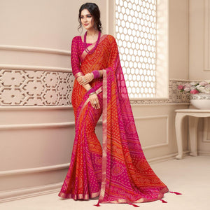 Orange-Pink Bandhani Printed Chiffon Saree With Tassels - Peachmode