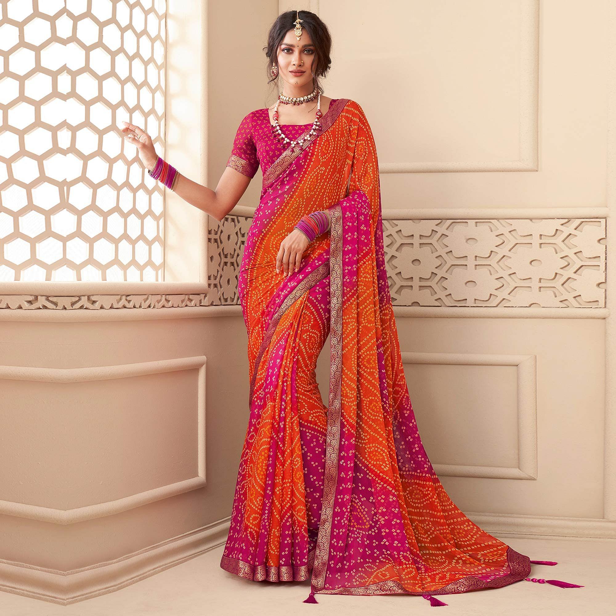 Orange-Pink Casual Wear Bandhani Printed Chiffon Saree With Tassels - Peachmode