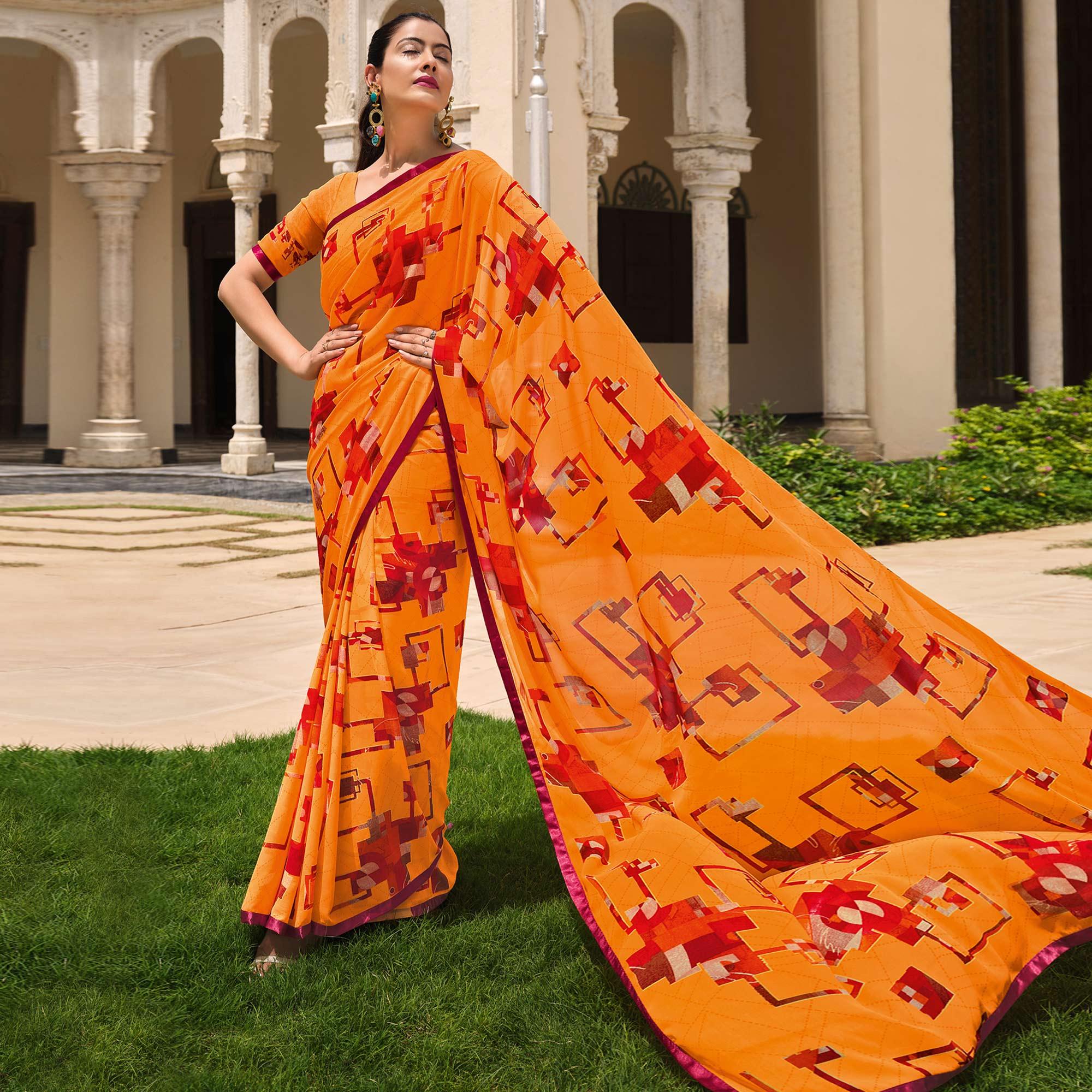 Orange Printed Georgette Saree - Peachmode