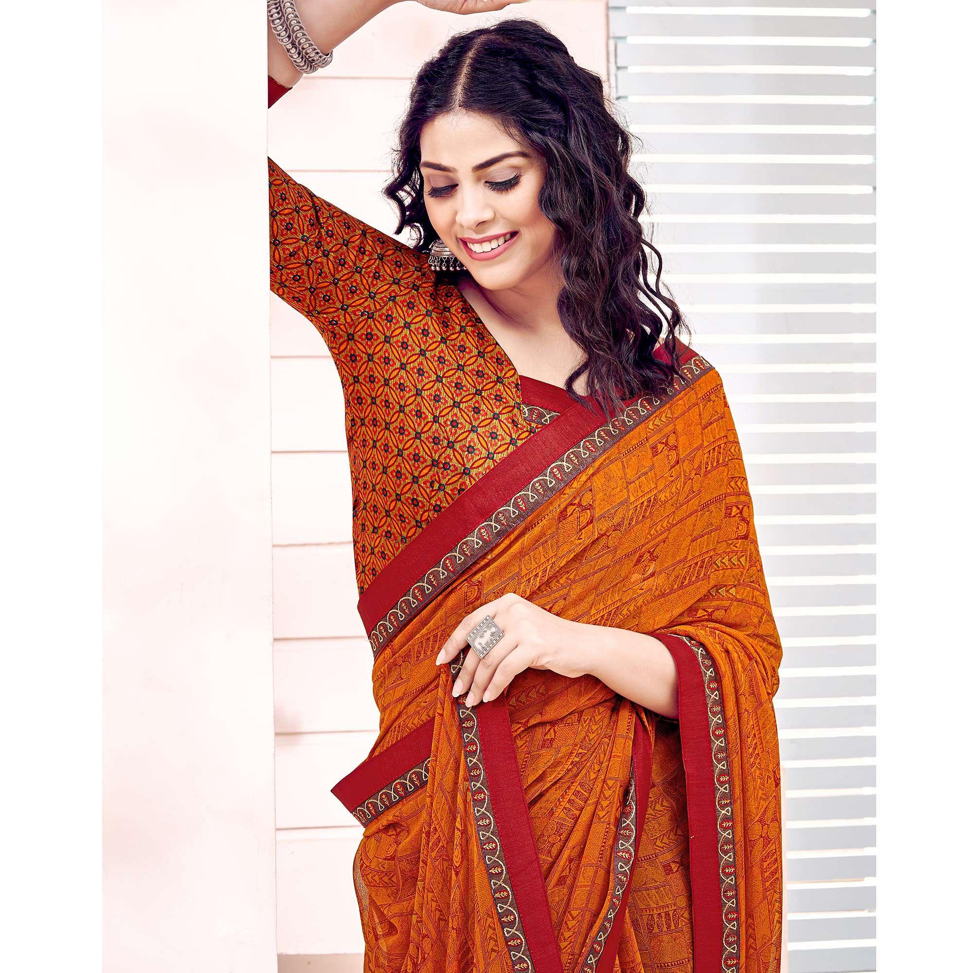 Orange Printed Georgette Saree - Peachmode