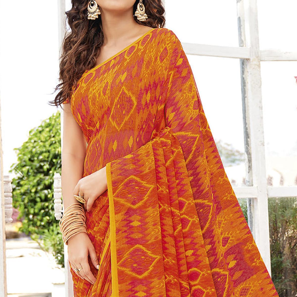 Orange Printed Georgette Saree - Peachmode