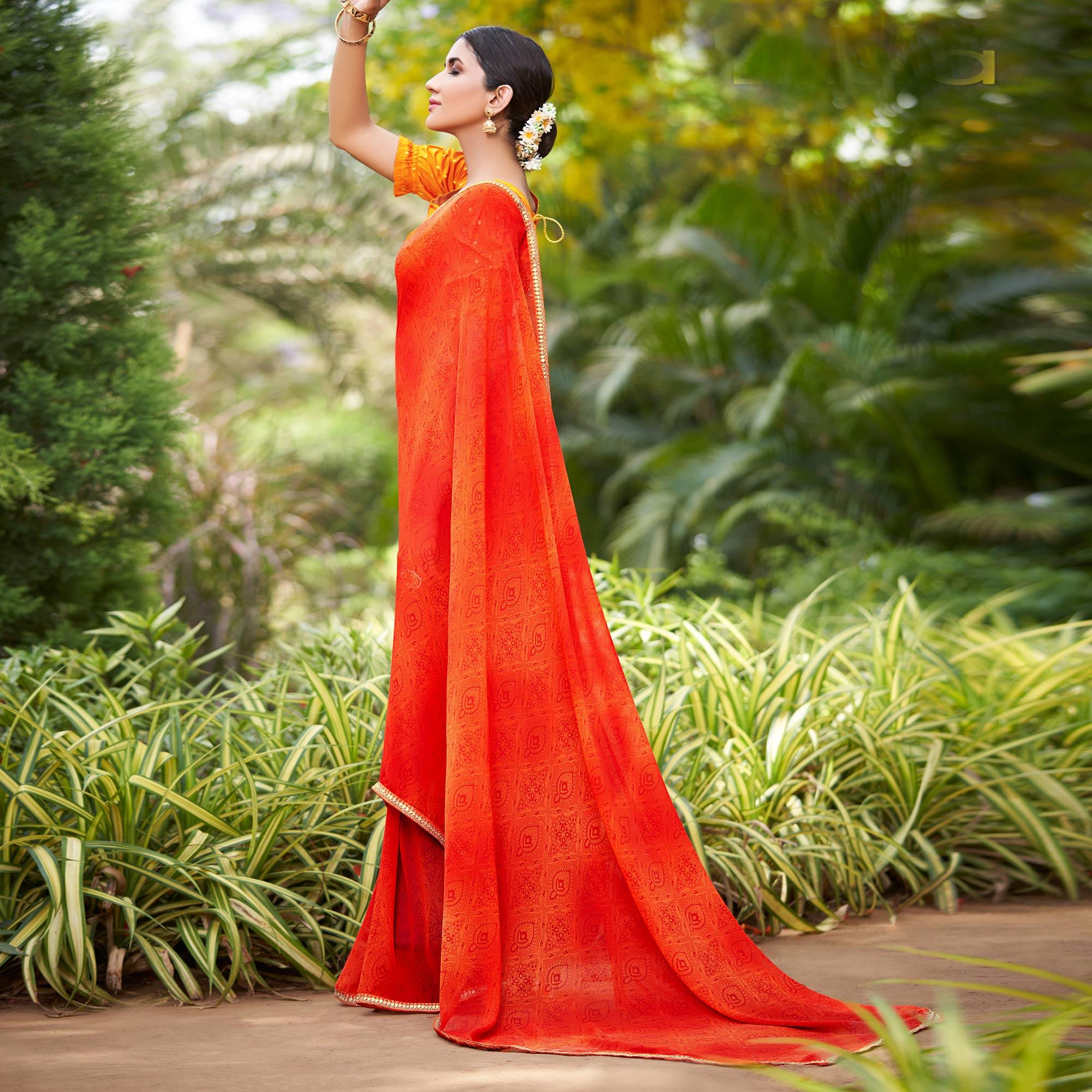 Orange Printed With Sequence Embroidered Border Georgette Saree - Peachmode