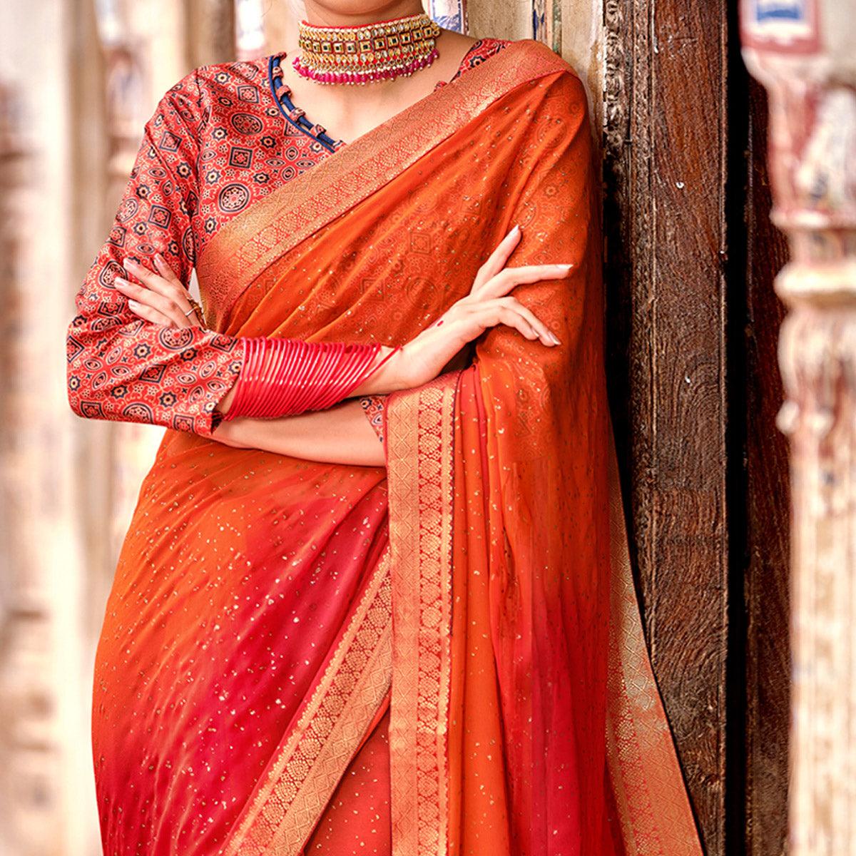 Orange-Red Partywear Printed Georgette Saree With Gold Zari - Peachmode