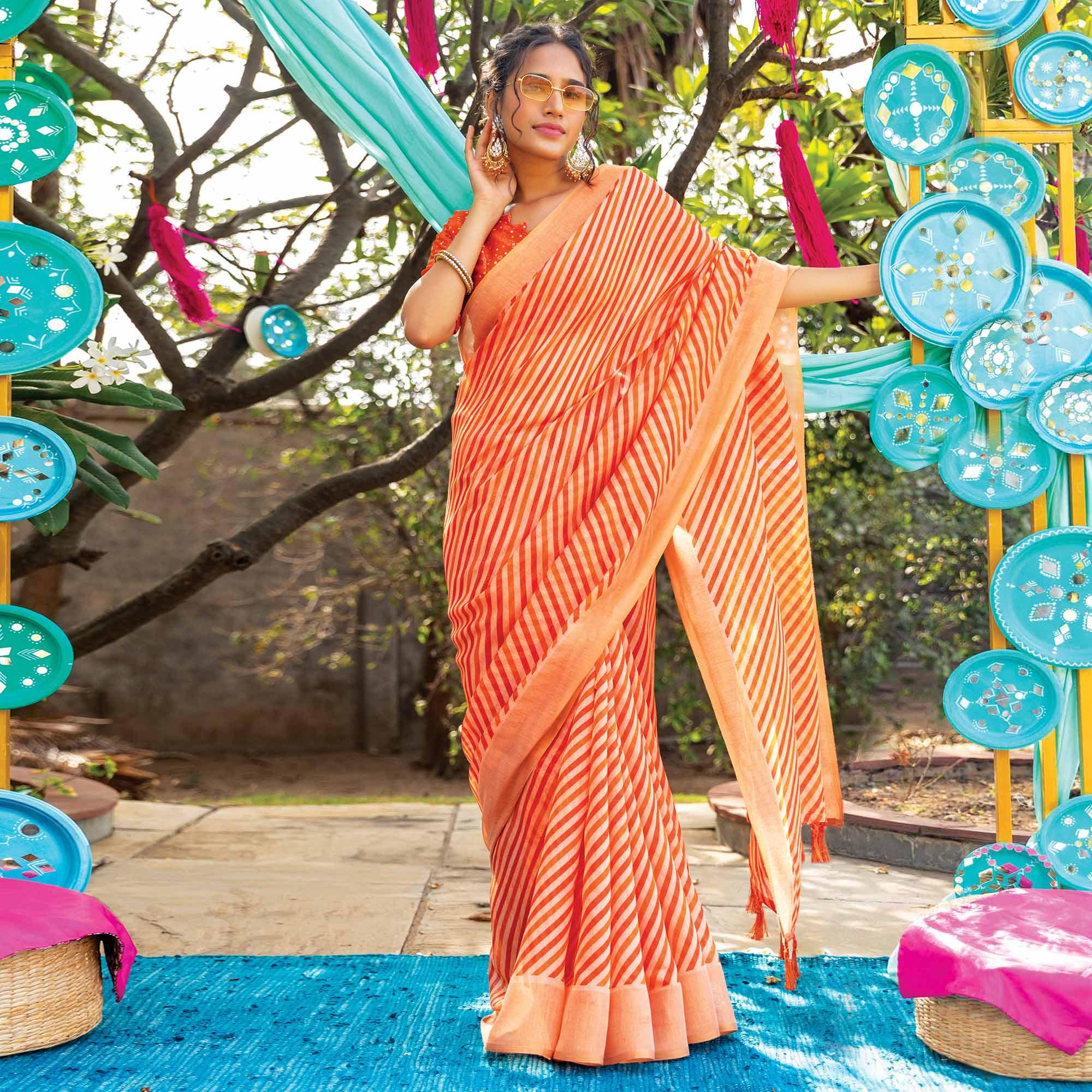 Orange Striped Printed Cotton Saree With Tassels - Peachmode