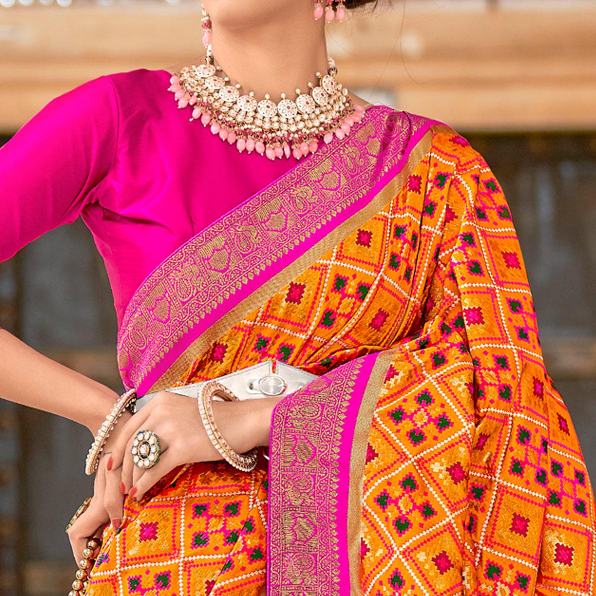 Orange Woven Art Silk Patola Saree With Tassels - Peachmode