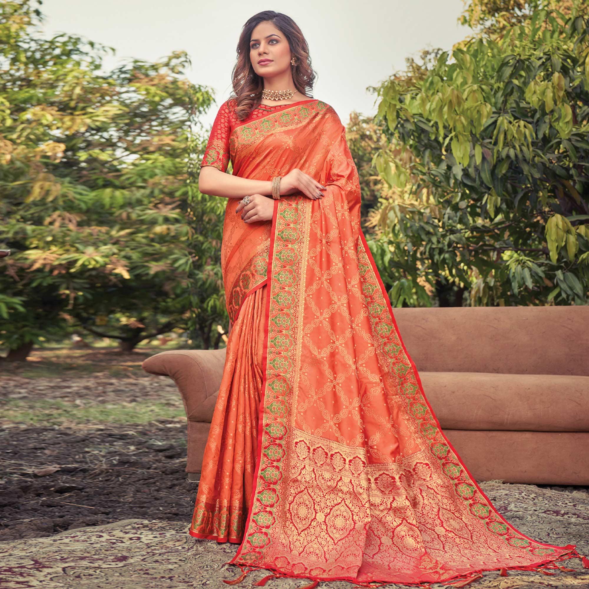 Orange Woven Banarasi Silk Saree With Tassels - Peachmode