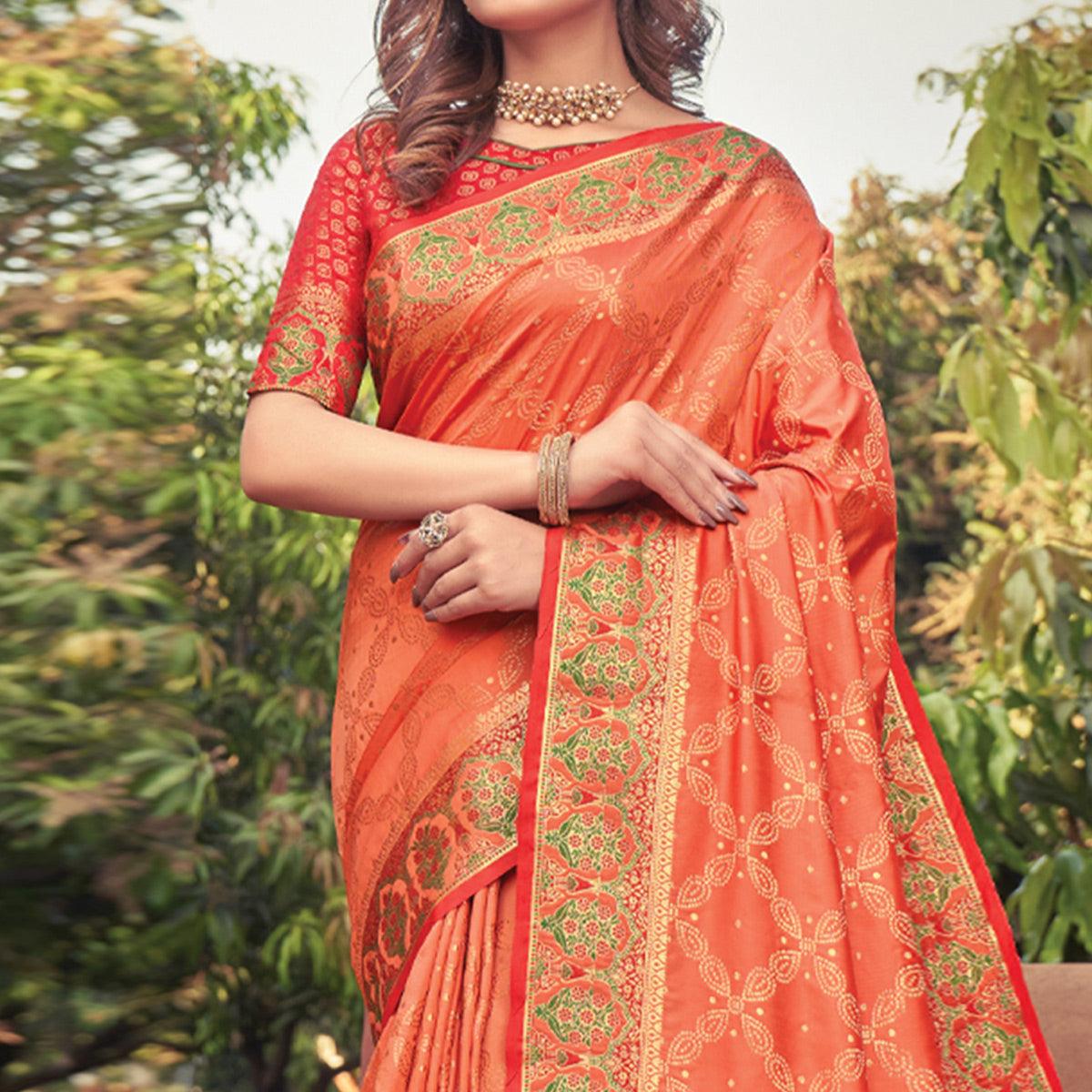 Orange Woven Banarasi Silk Saree With Tassels - Peachmode