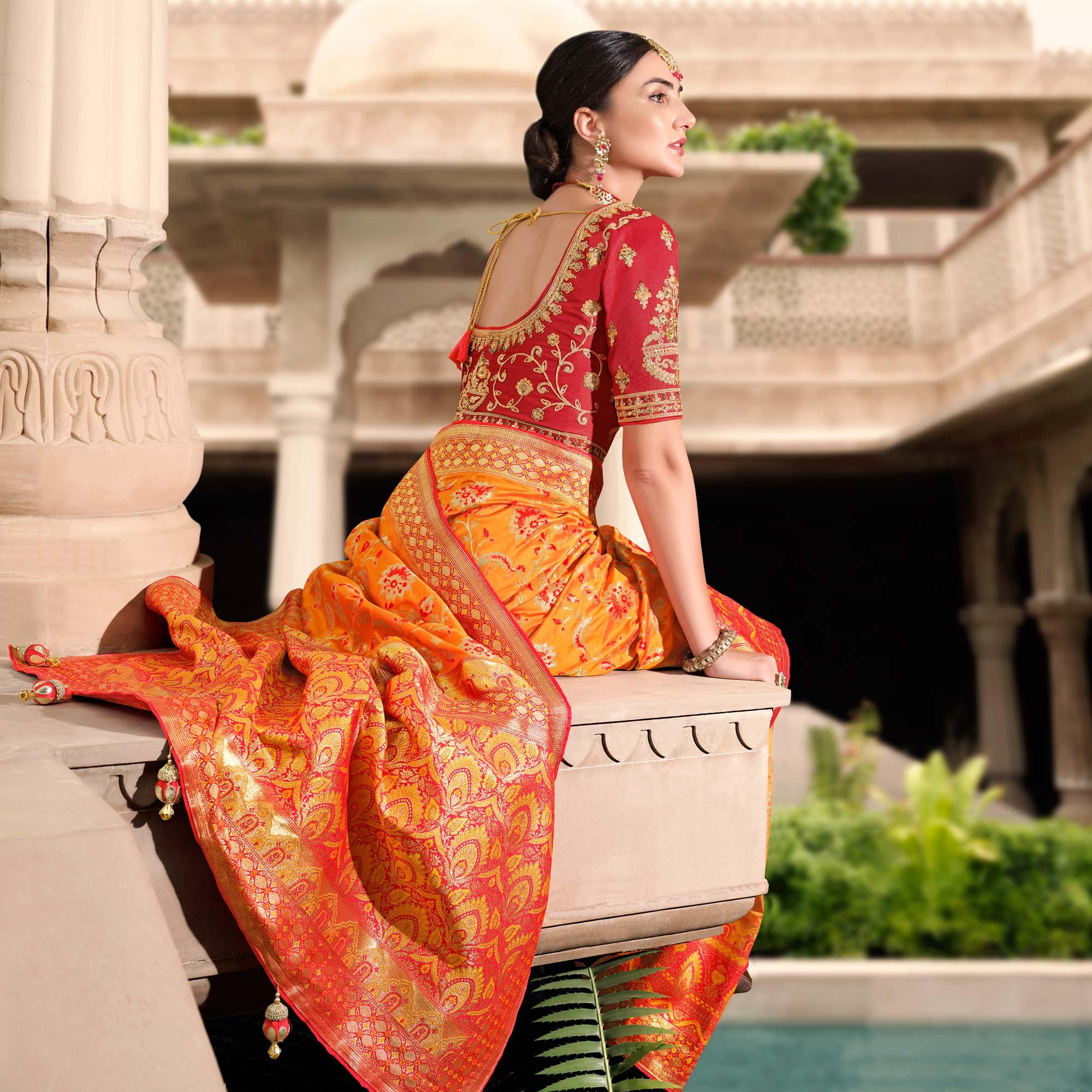 Orange Woven Banarasi Silk Saree With Tassels - Peachmode