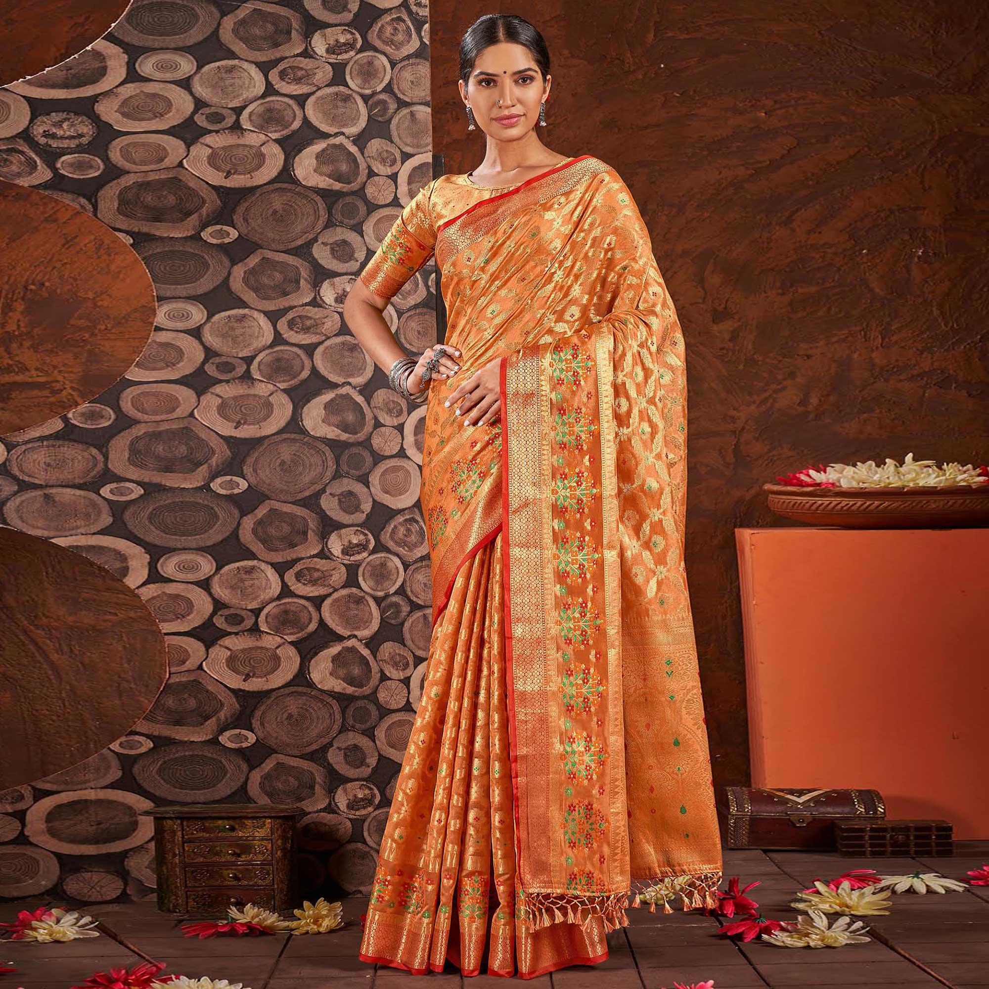 Orange Woven Organza Saree With Tassels - Peachmode