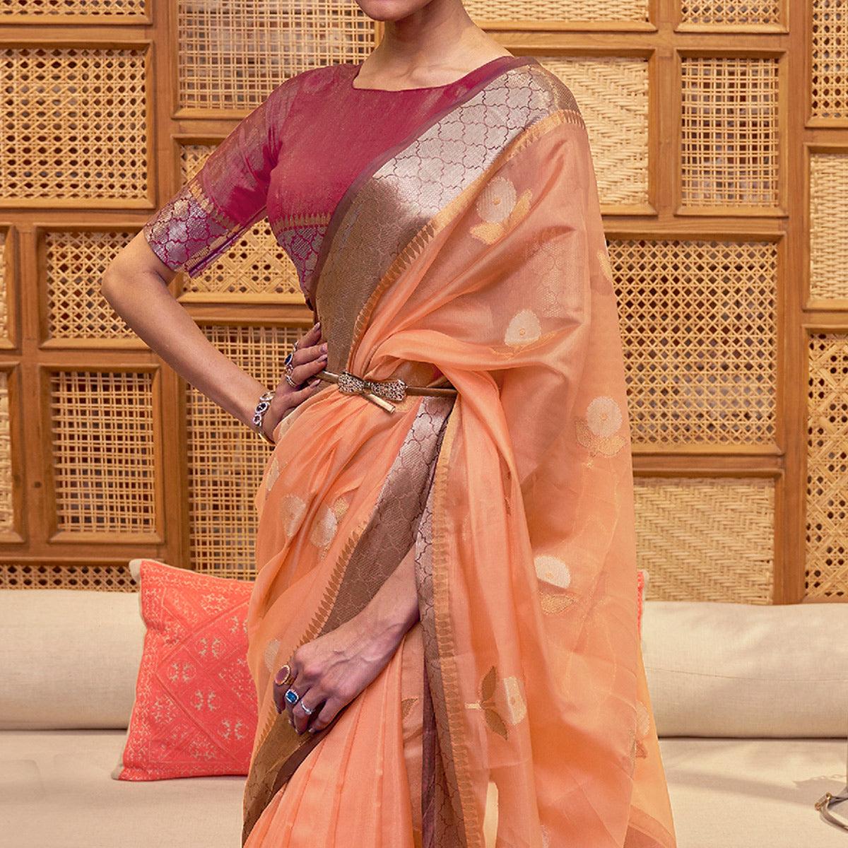 Orange Woven Organza Saree With Tassels - Peachmode