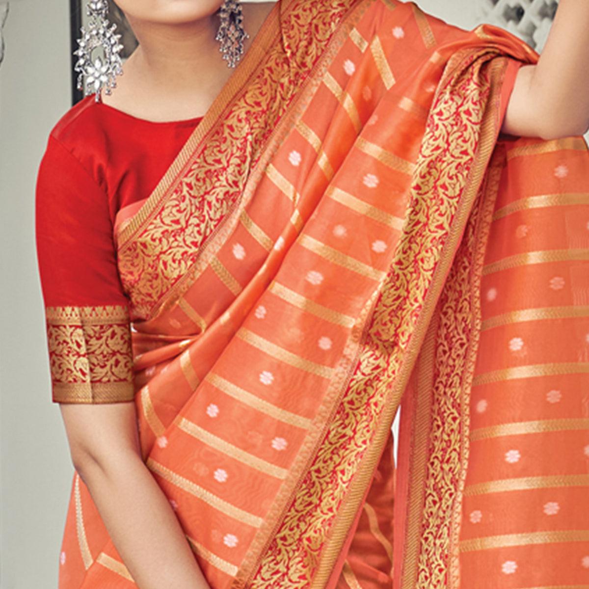 Orange Woven Organza Saree With Tassels - Peachmode