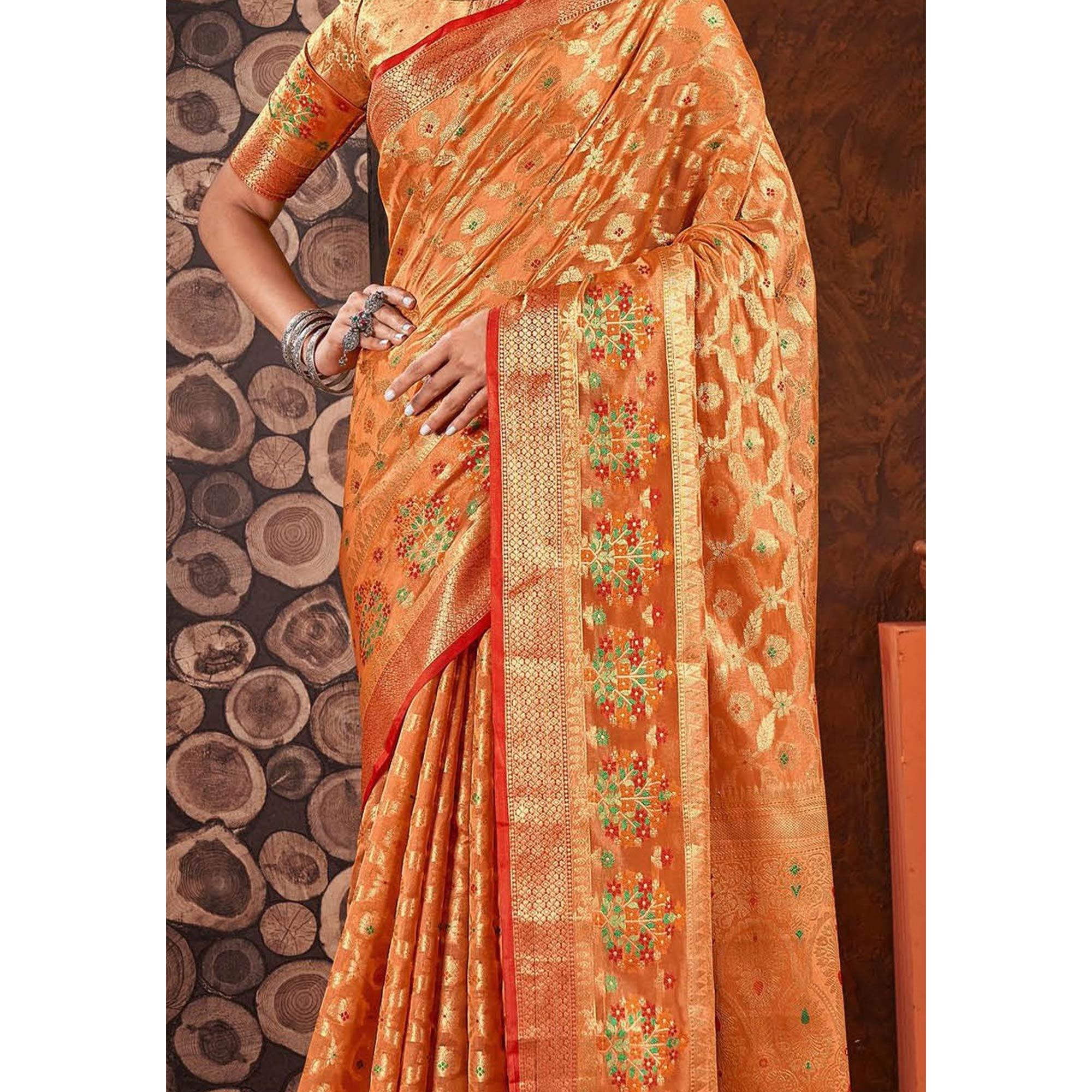 Orange Woven Organza Saree With Tassels - Peachmode