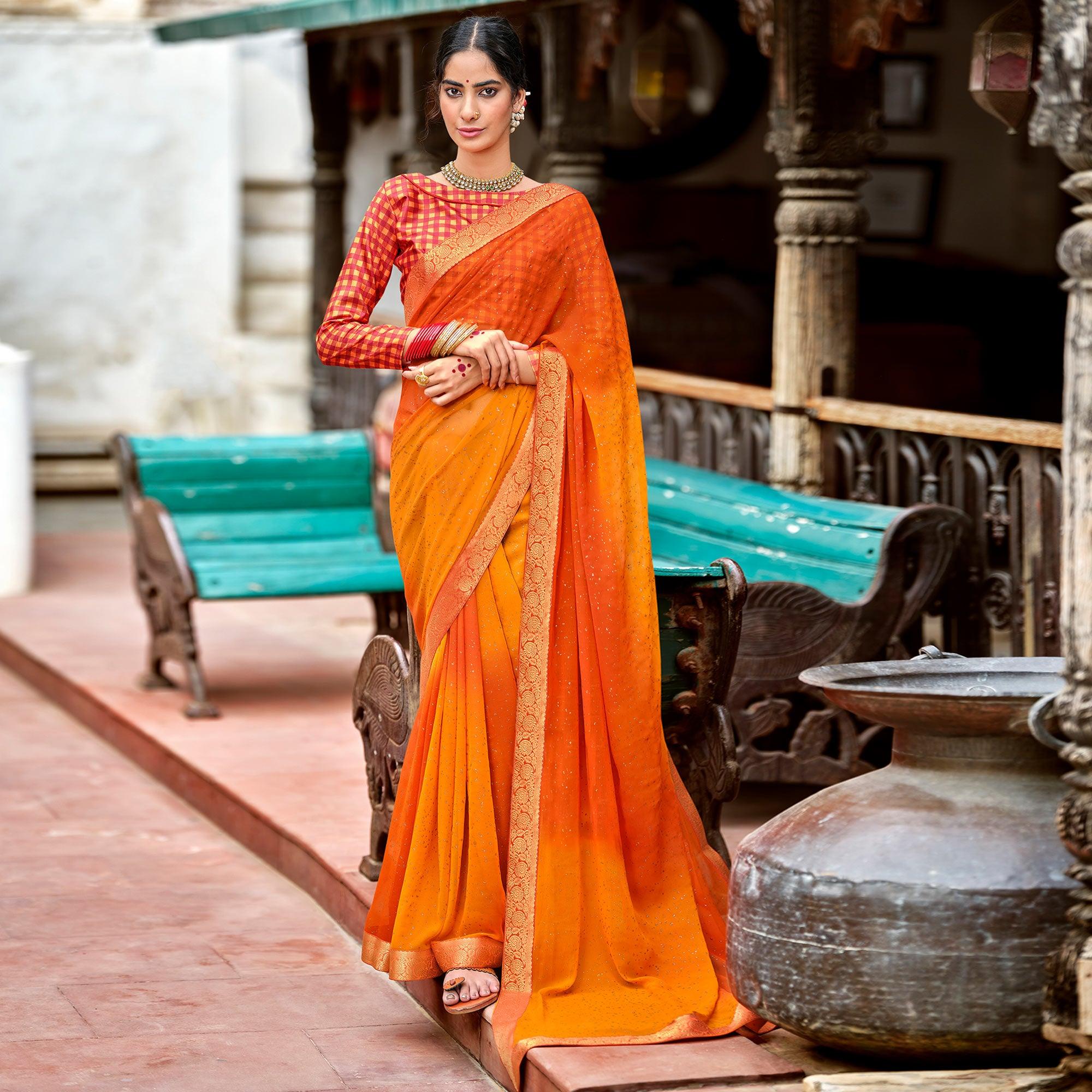 Orange-Yellow Partywear Printed Georgette Saree With Gold Zari - Peachmode