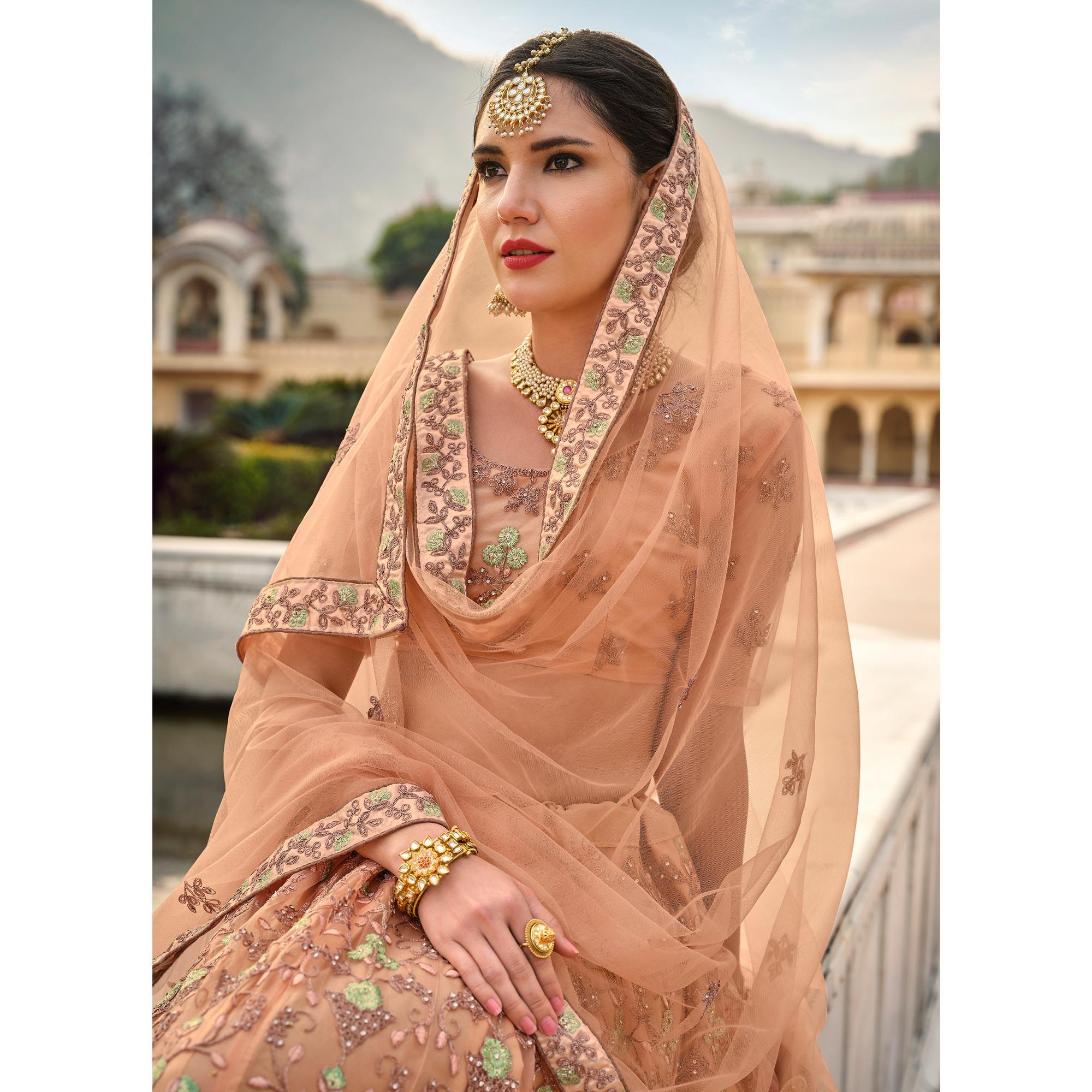 Peach Partywear Embellished & Embroidered Net Lehenga Choli - Peachmode