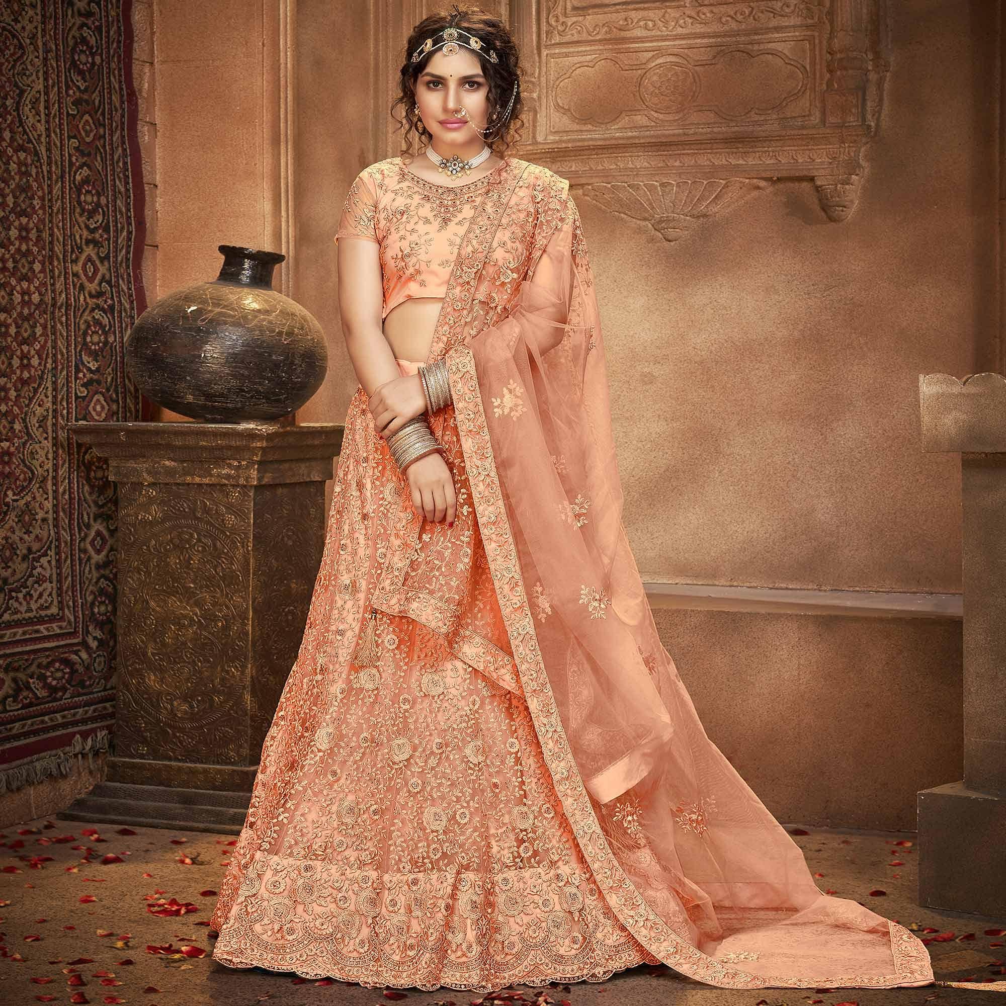 Peach Partywear Multi Sequence Embroidered Net Lehenga Choli - Peachmode