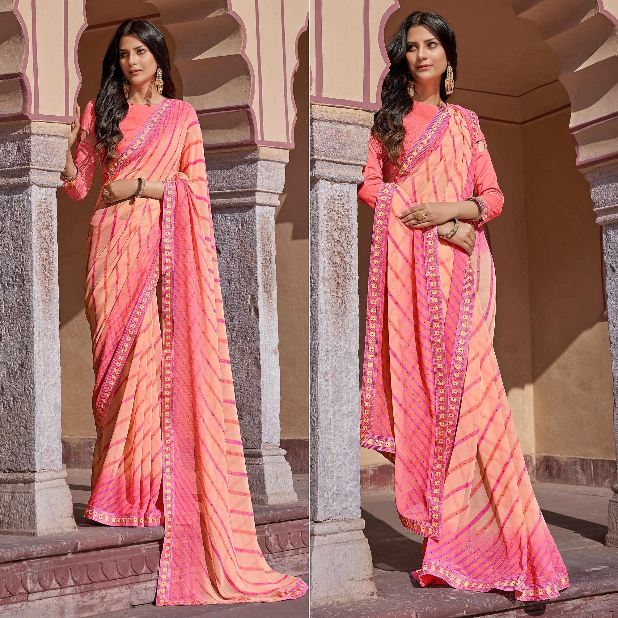 Peach Printed With Embellished Georgette Saree - Peachmode
