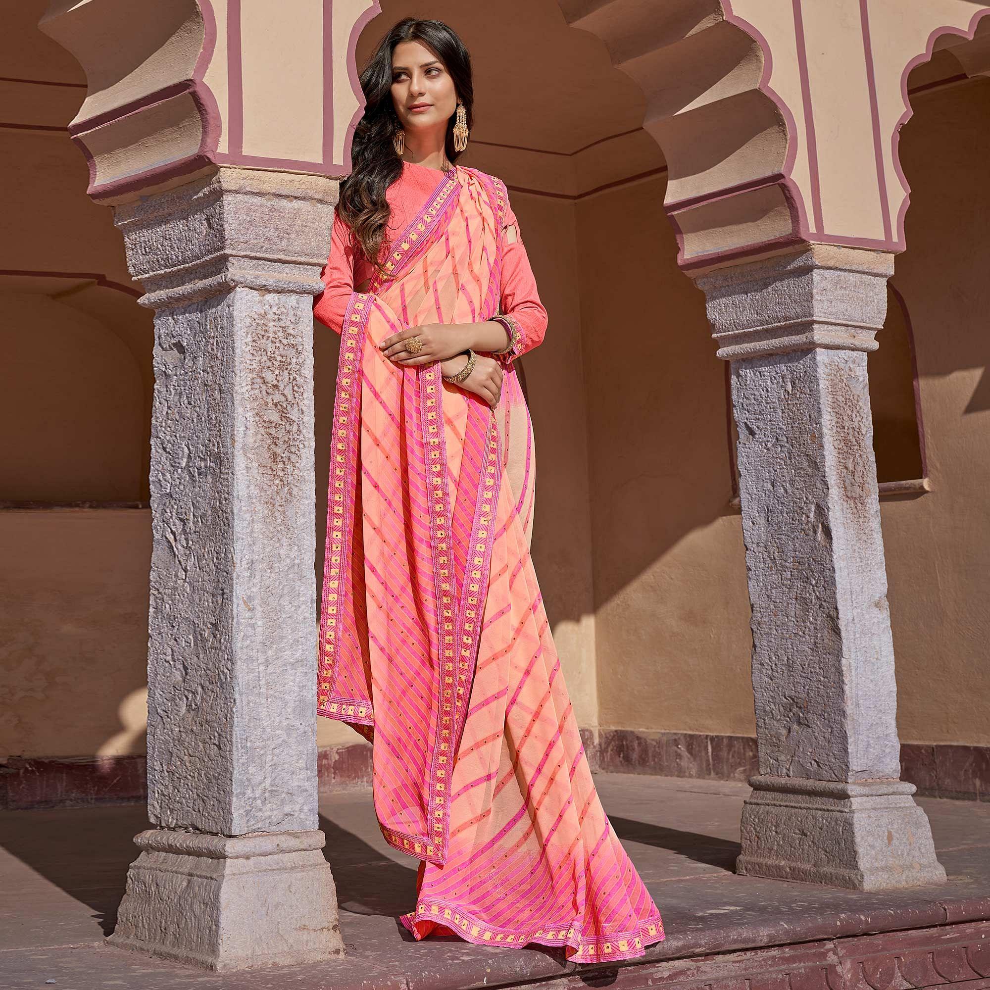 Peach Printed With Embellished Georgette Saree - Peachmode