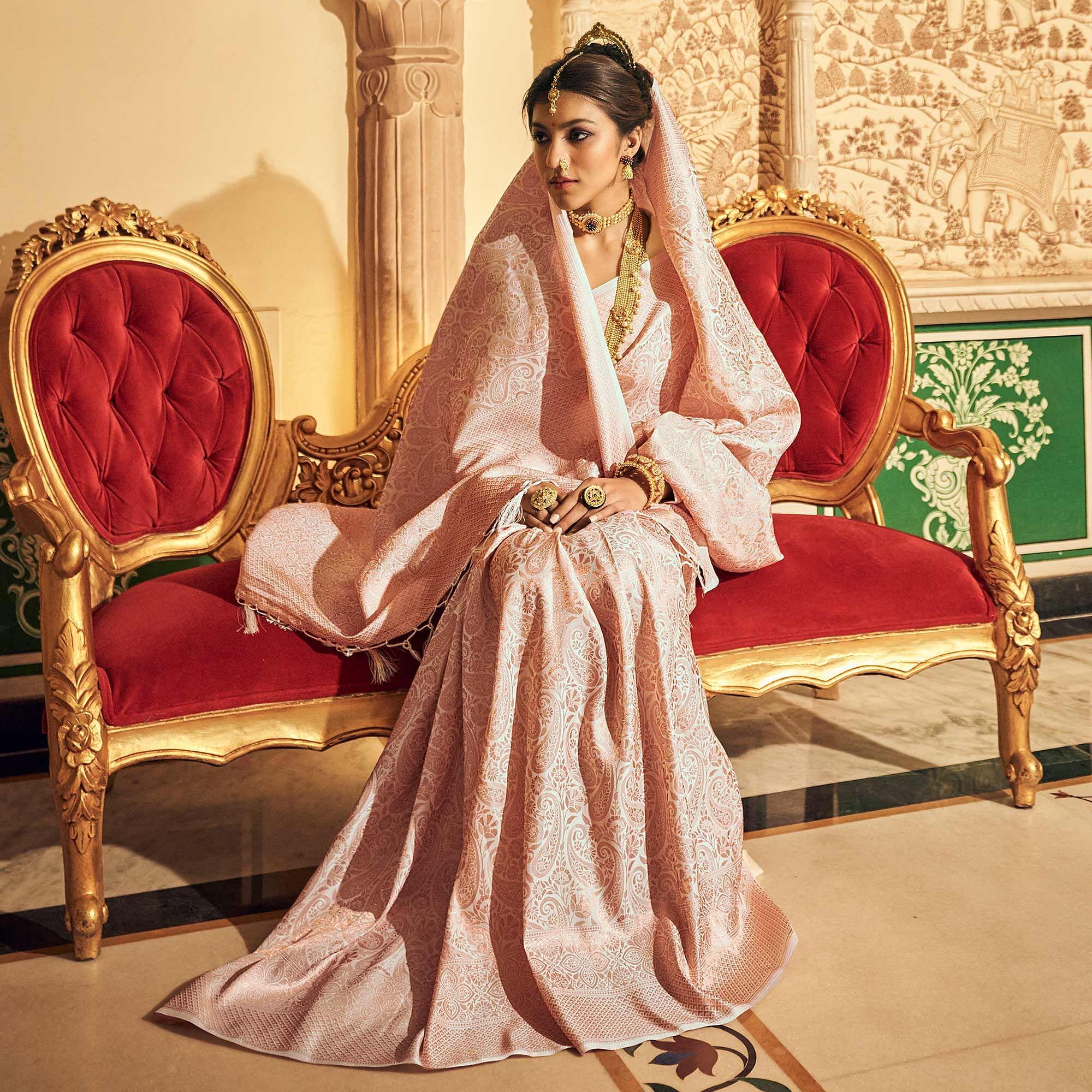 Peach Woven Art Silk Saree With Tassels - Peachmode