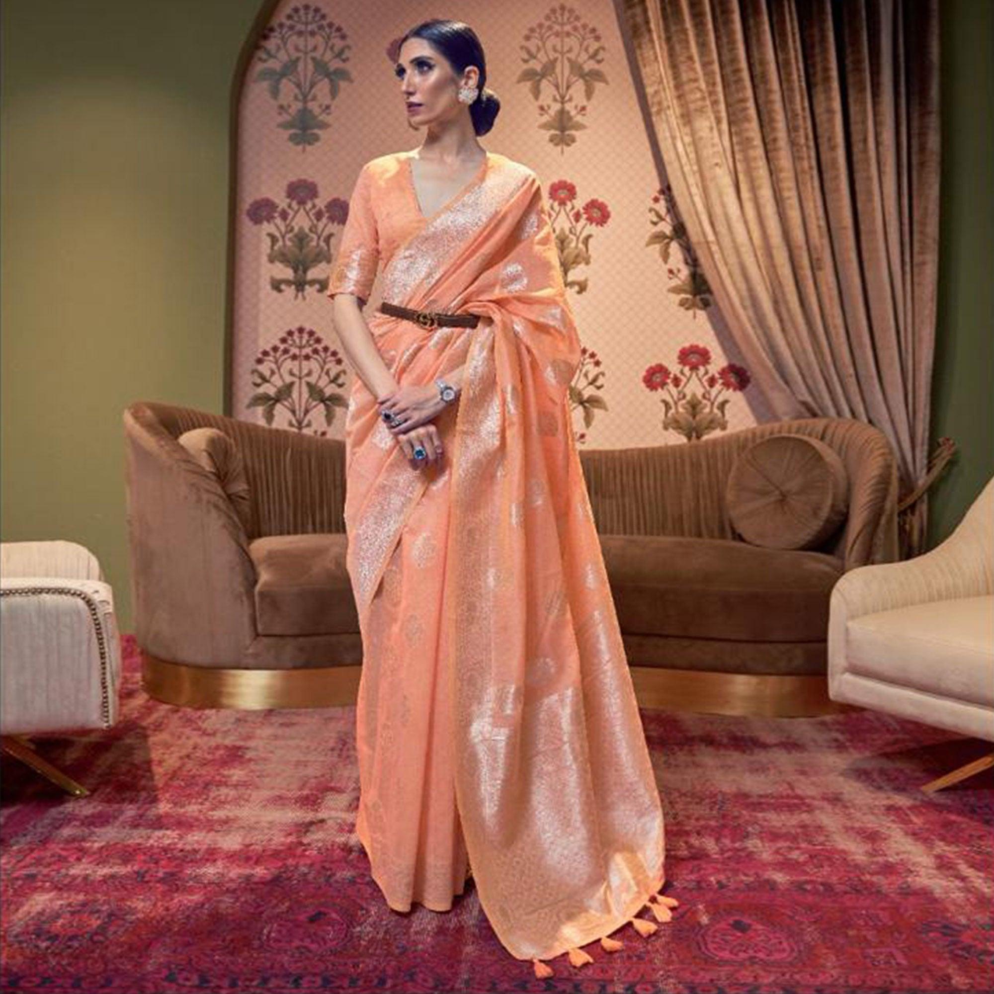 Peach Woven Linen Saree With Tassels - Peachmode