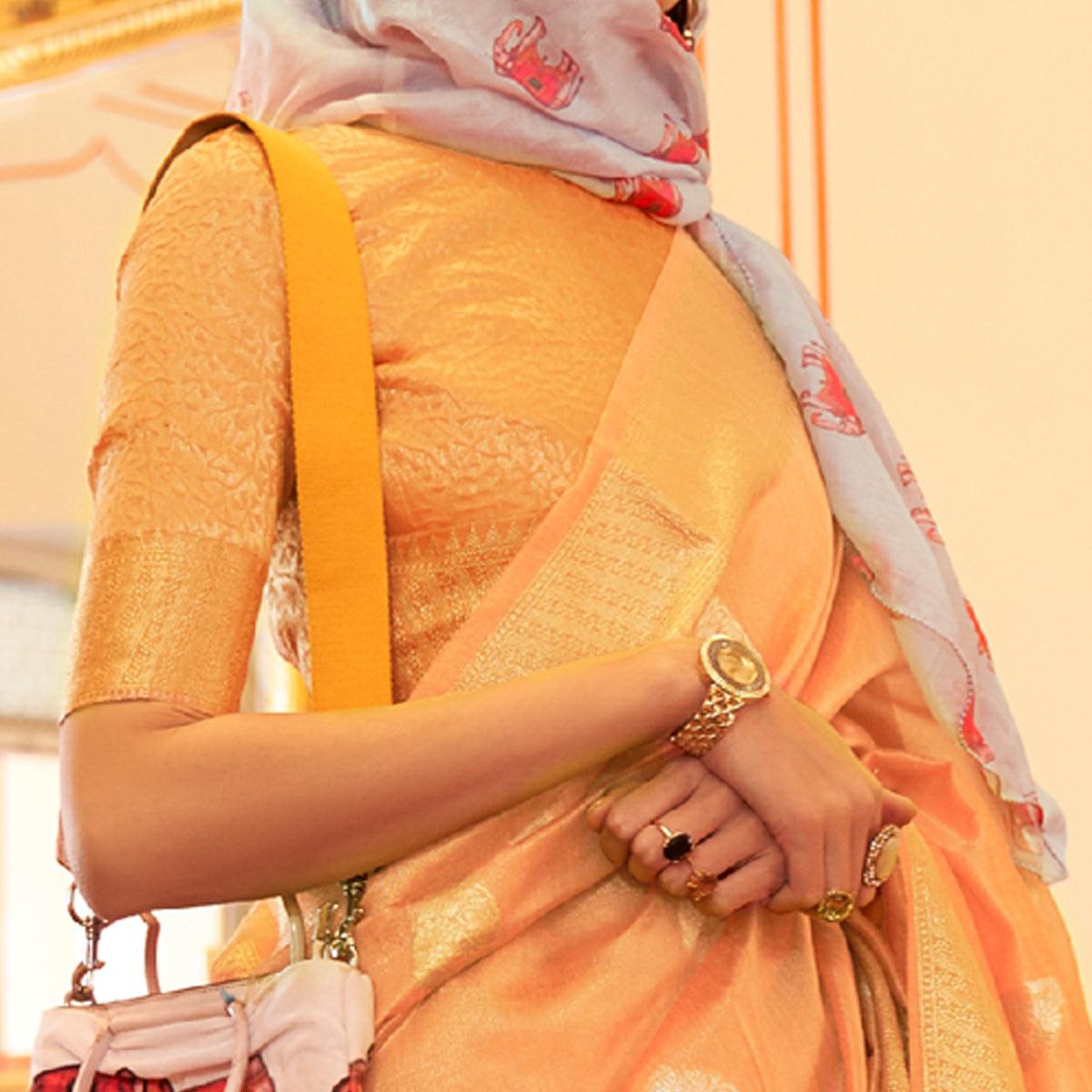 Peach Woven Linen Saree With Tassels - Peachmode