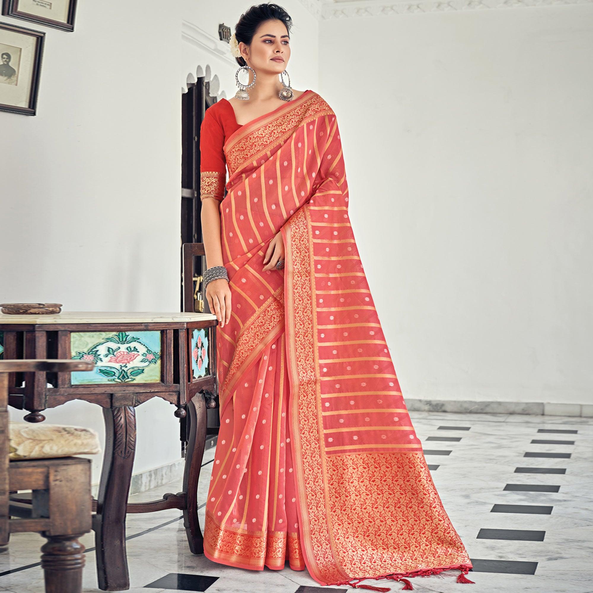Peach Woven Organza Saree With Tassels - Peachmode