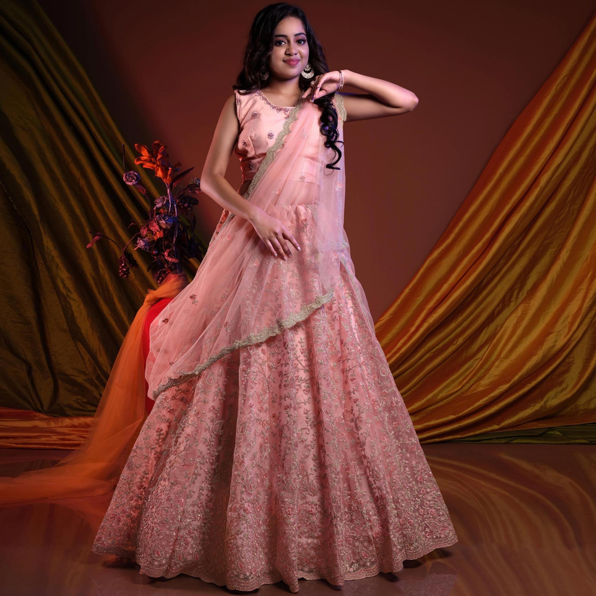 Pink Embroidered Netted Lehenga Choli - Peachmode