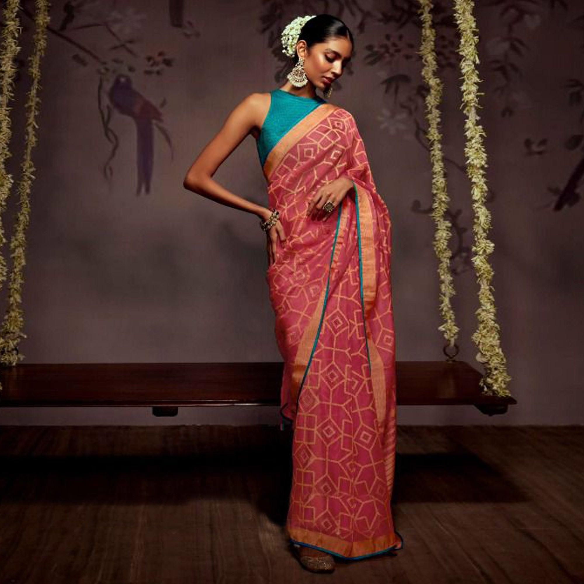 Pink Woven Brasso Saree With Tassels - Peachmode