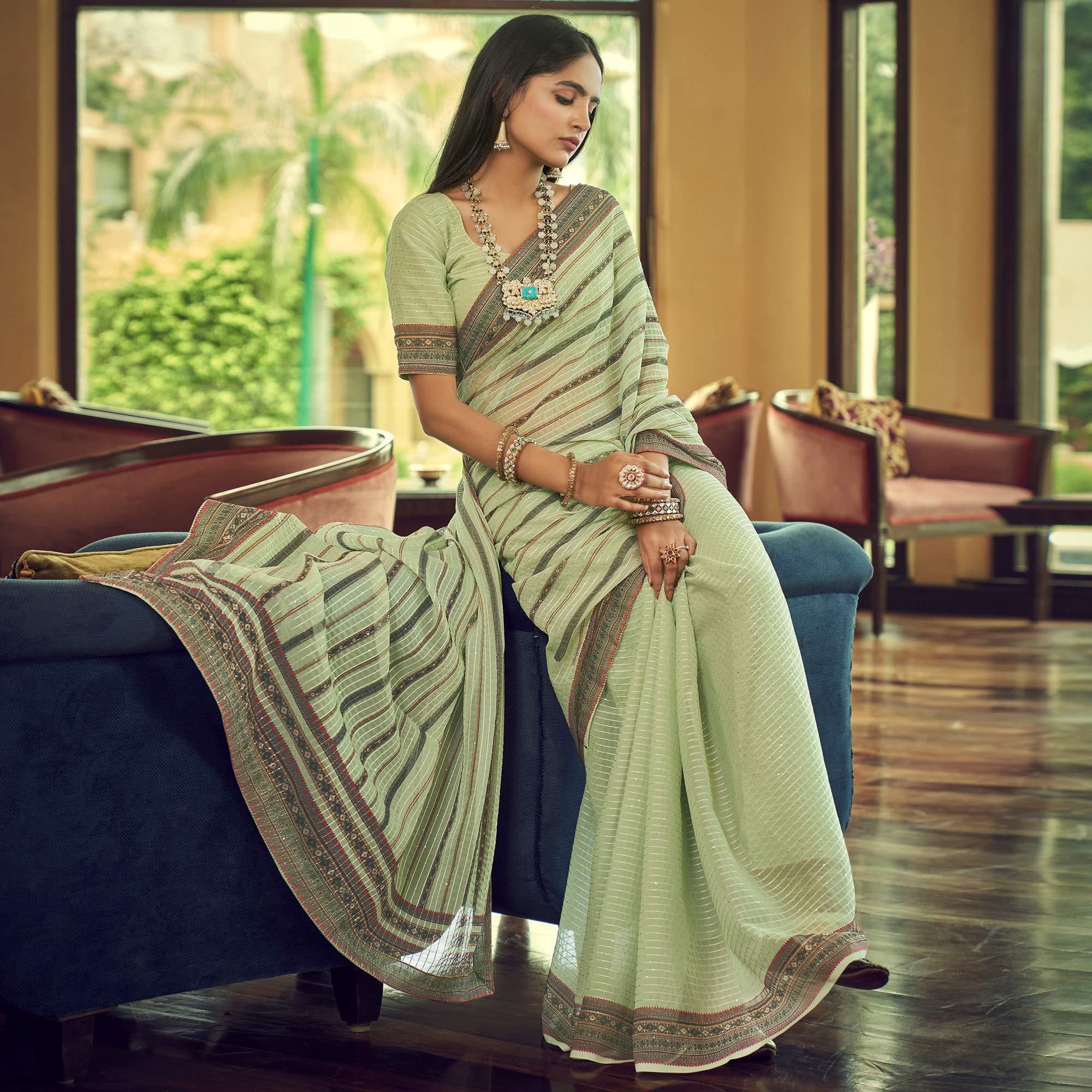 Pista Green Printed With Embellished Georgette Half and Half Saree - Peachmode