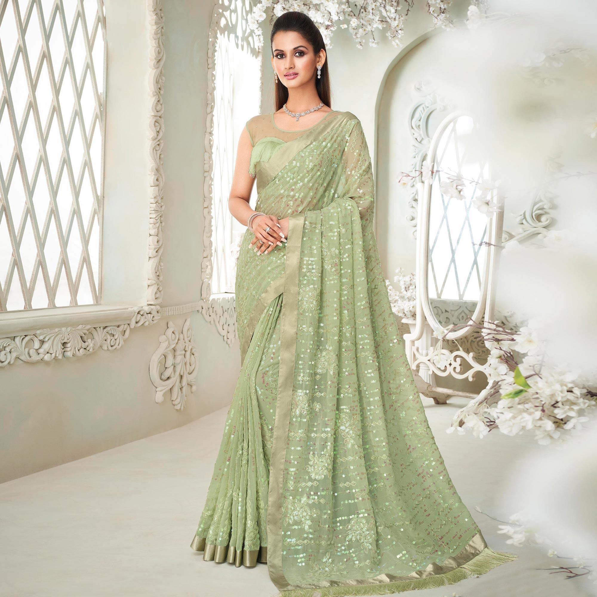 Pista Green Sequence Embroidered Georgette Saree With Tassels - Peachmode