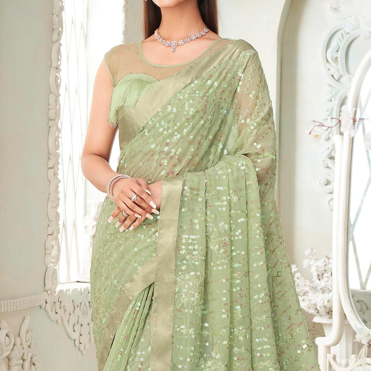 Pista Green Sequence Embroidered Georgette Saree With Tassels - Peachmode