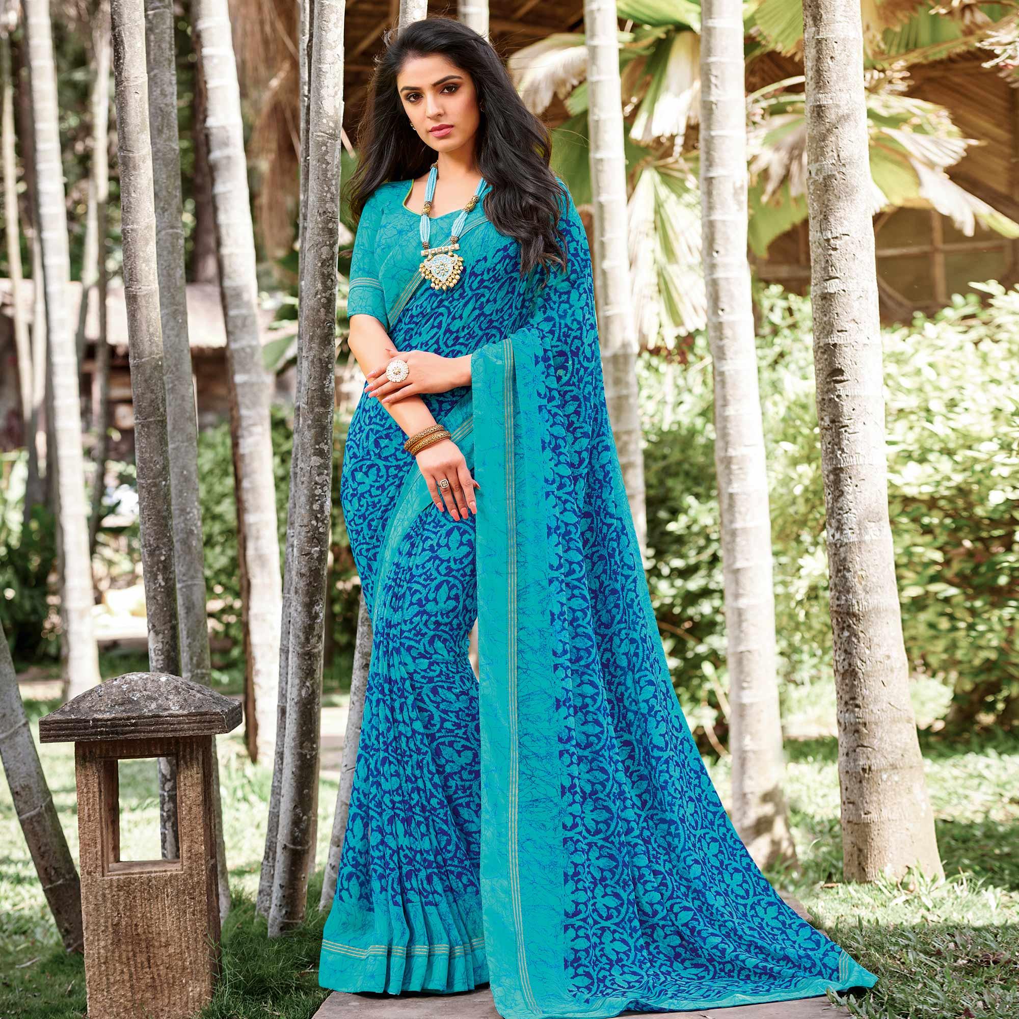 Pleasant Blue Colored Partywear Printed Georgette Saree - Peachmode