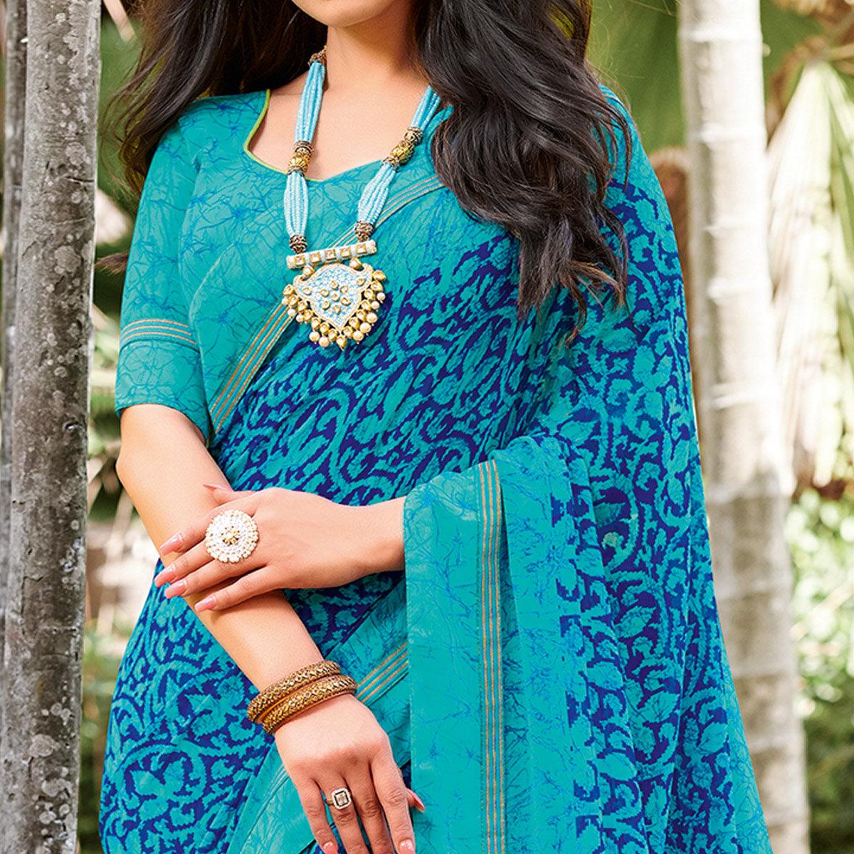 Pleasant Blue Colored Partywear Printed Georgette Saree - Peachmode