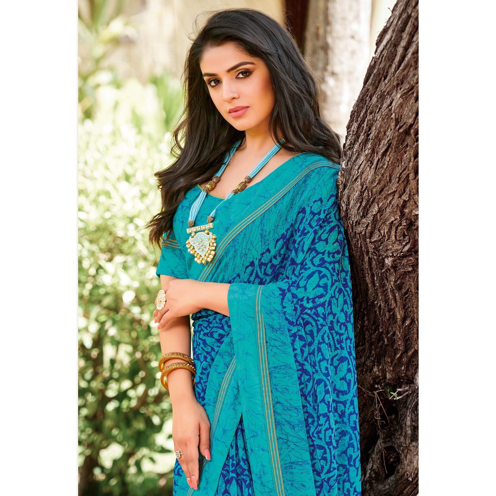 Pleasant Blue Colored Partywear Printed Georgette Saree - Peachmode