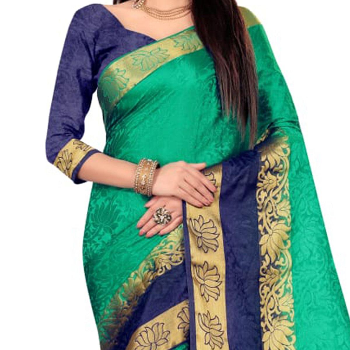 Pleasant Green Colored Festive Wear Woven Nylon Saree - Peachmode