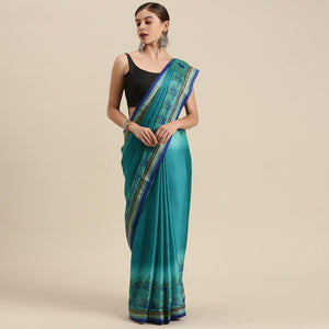 Pleasant Turquoise Blue Colored Partywear Printed Rangoli Silk Saree - Peachmode
