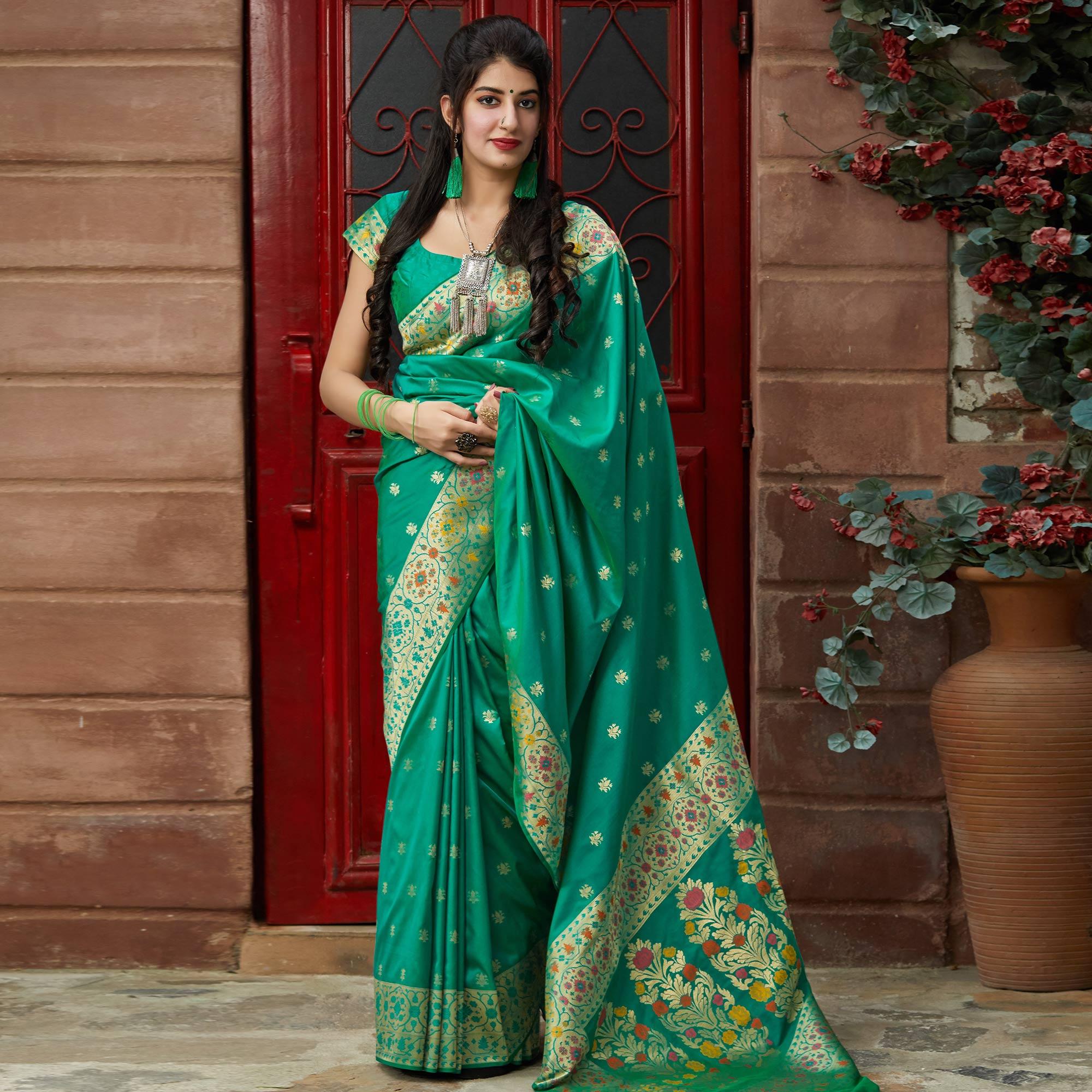 Pleasant Turquoise Green Colored Festive Wear Woven Soft Silk Saree - Peachmode