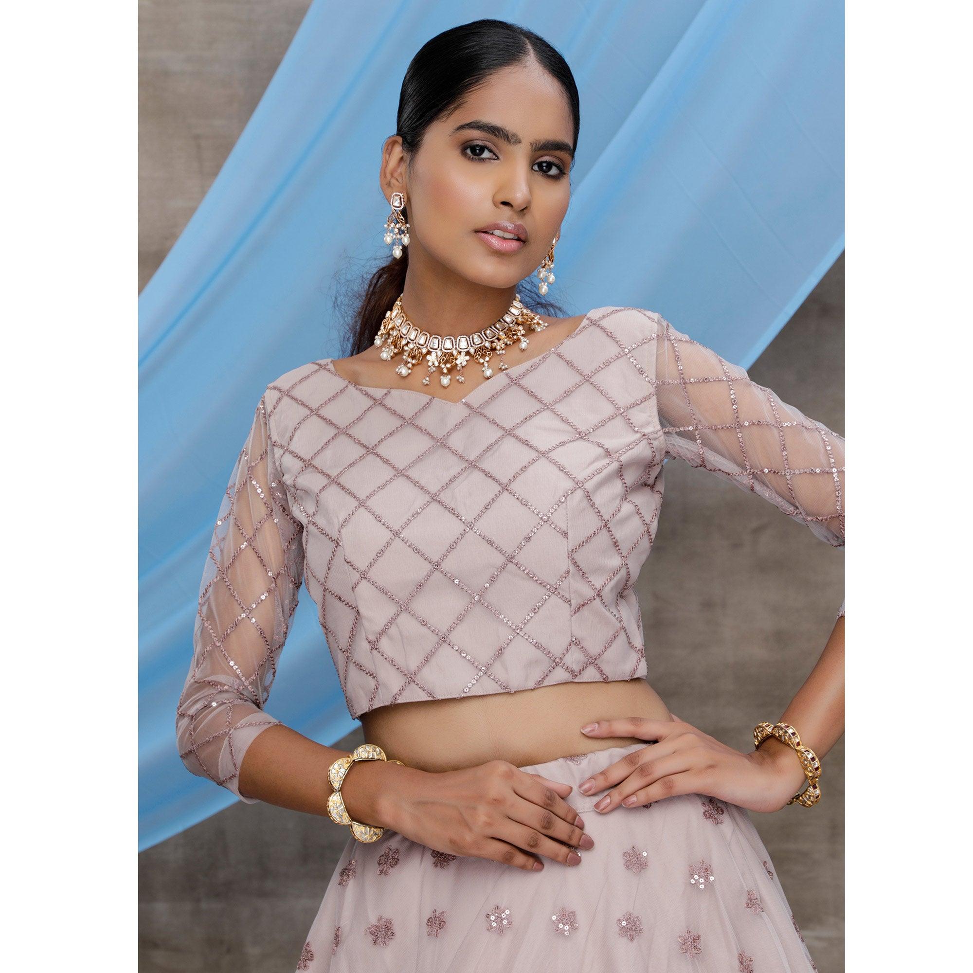 Preferable Dusty Purple Colored Designer Partywear Embroidered Net Lehenga Choli - Peachmode