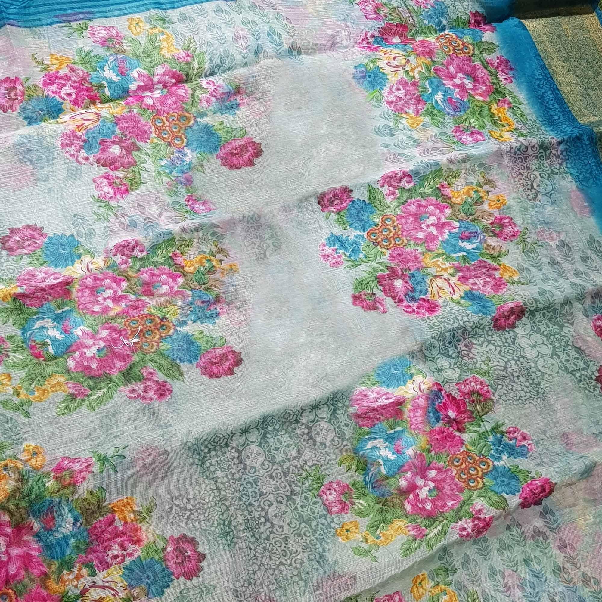 Pretty Sea Green Festive Wear Semi Floral Printed Linen Jari Border Printed Saree - Peachmode