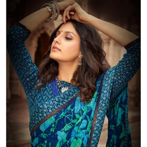 Prominent Blue Colored Casual Floral Printed Georgette Saree - Peachmode