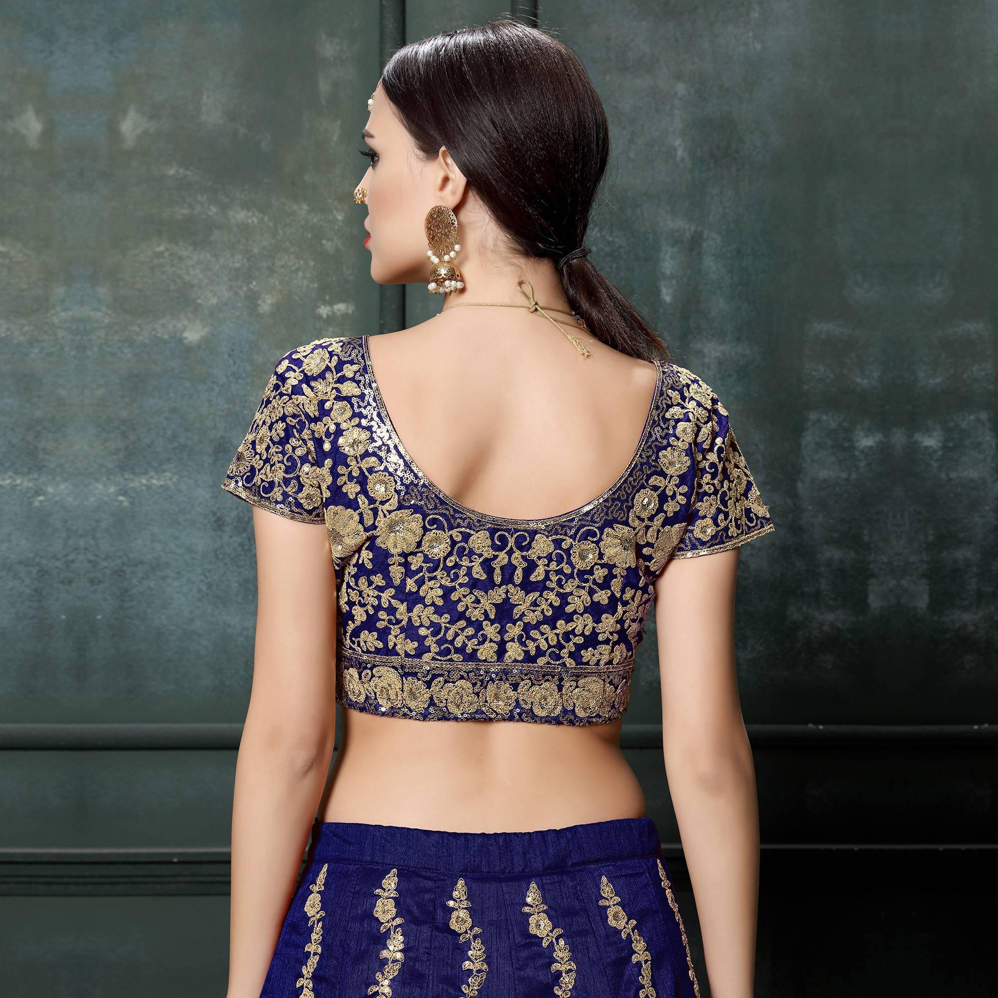 Prominent Blue Colored Wedding Wear Embroidered Raw Silk Lehenga - Peachmode