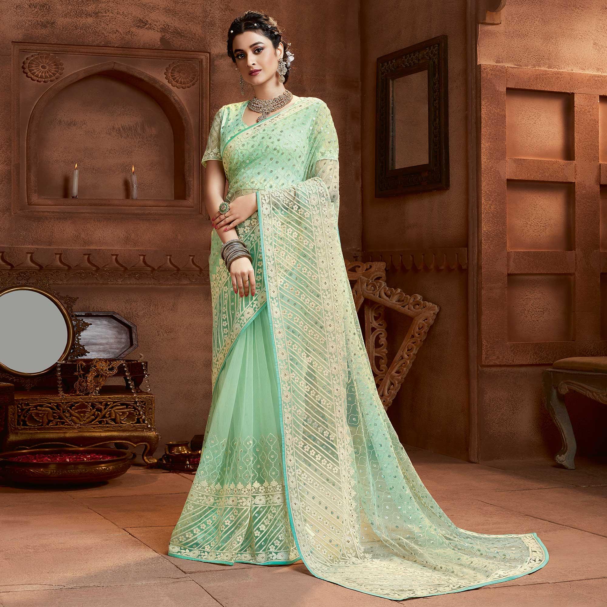 Prominent Mint Green Coloured Partywear Embroidered Soft Net Saree - Peachmode
