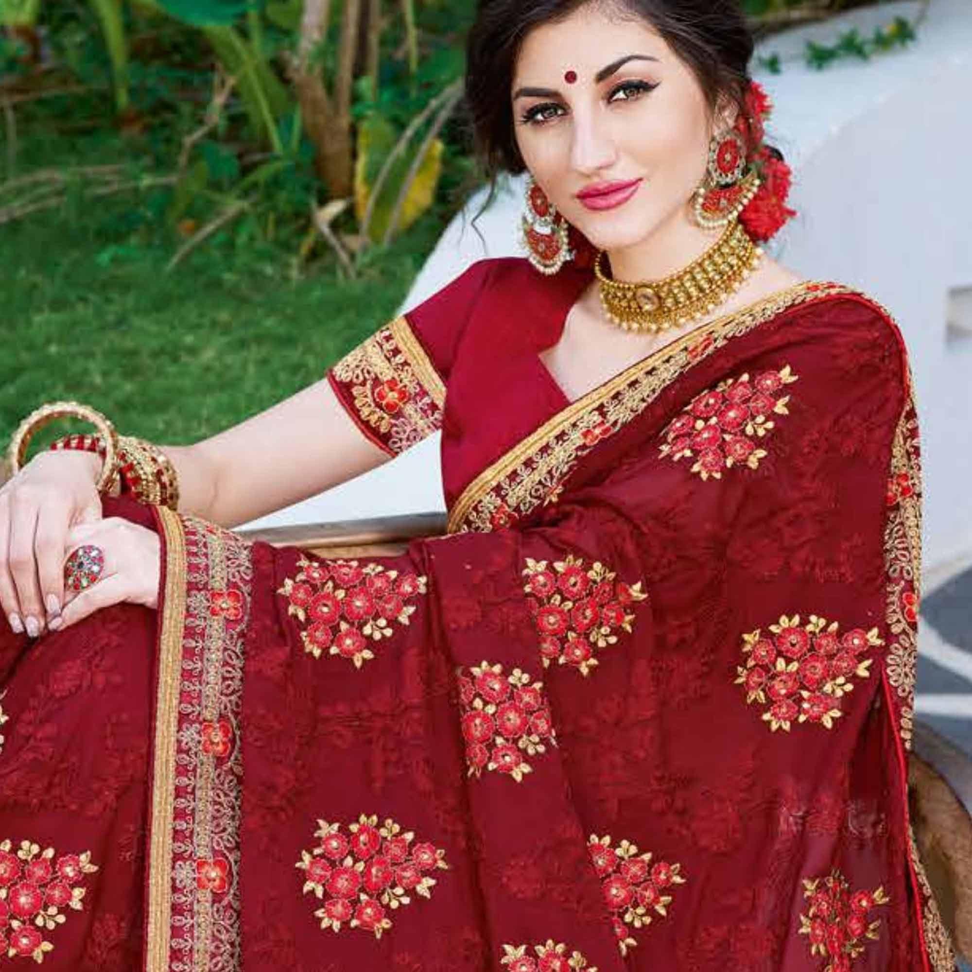 Radiant Maroon Colored Partywear Embroidered Georgette Silk Saree - Peachmode