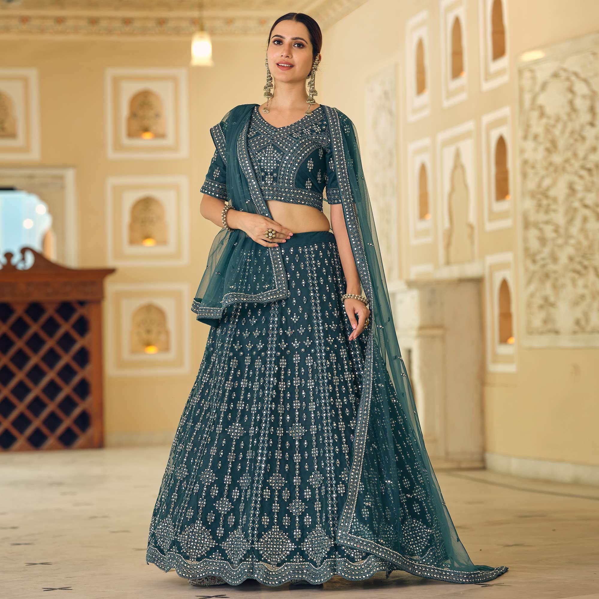 Rama Blue Wedding Wear Embellished Netted Lehenga Choli - Peachmode