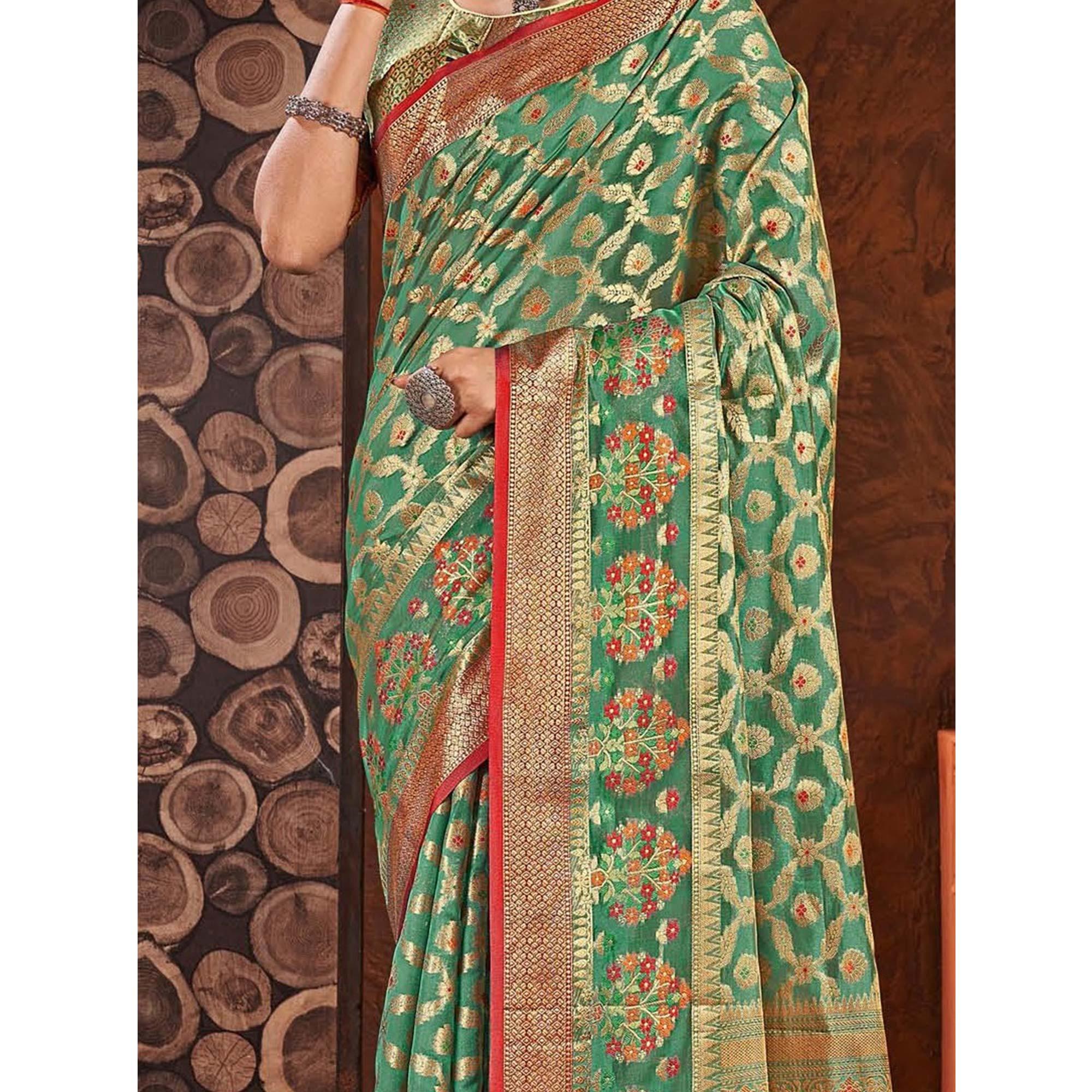 Rama Green Woven Organza Saree With Tassels - Peachmode