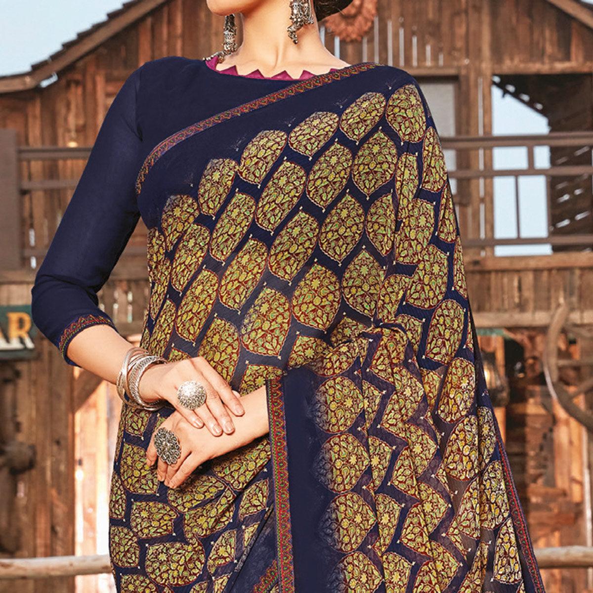Ravishing Navy Blue Coloured Partywear Pure Georgette Floral Printed Saree With Fancy Lace Border - Peachmode