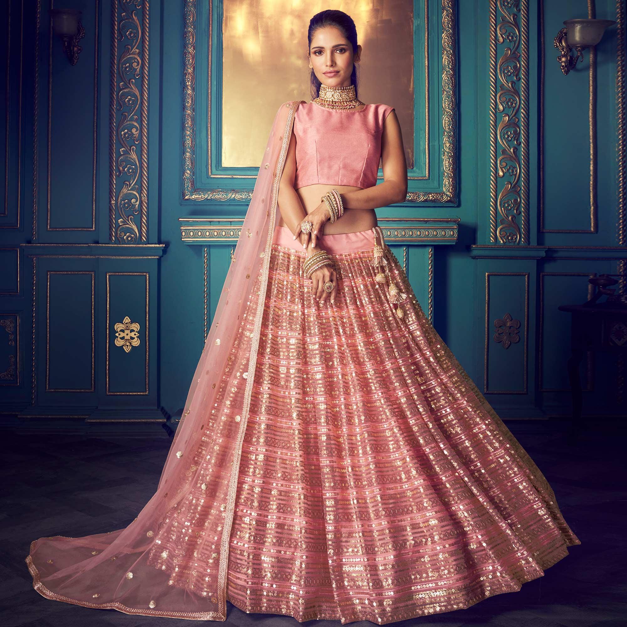 Ravishing Pink Colored Partywear Embroidered Soft Net Lehenga Choli - Peachmode