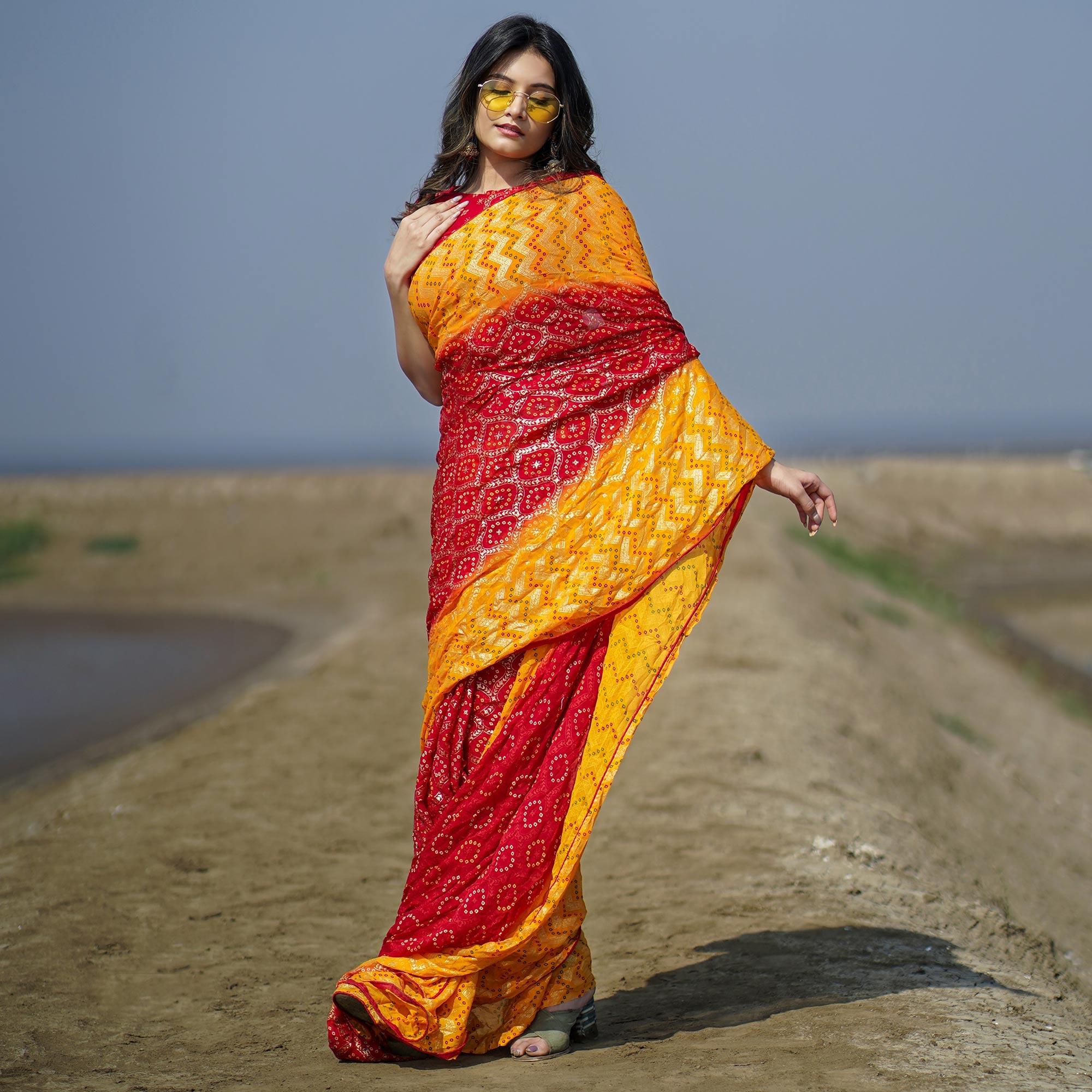 Red Casual Wear Foil Printed Crepe Saree - Peachmode