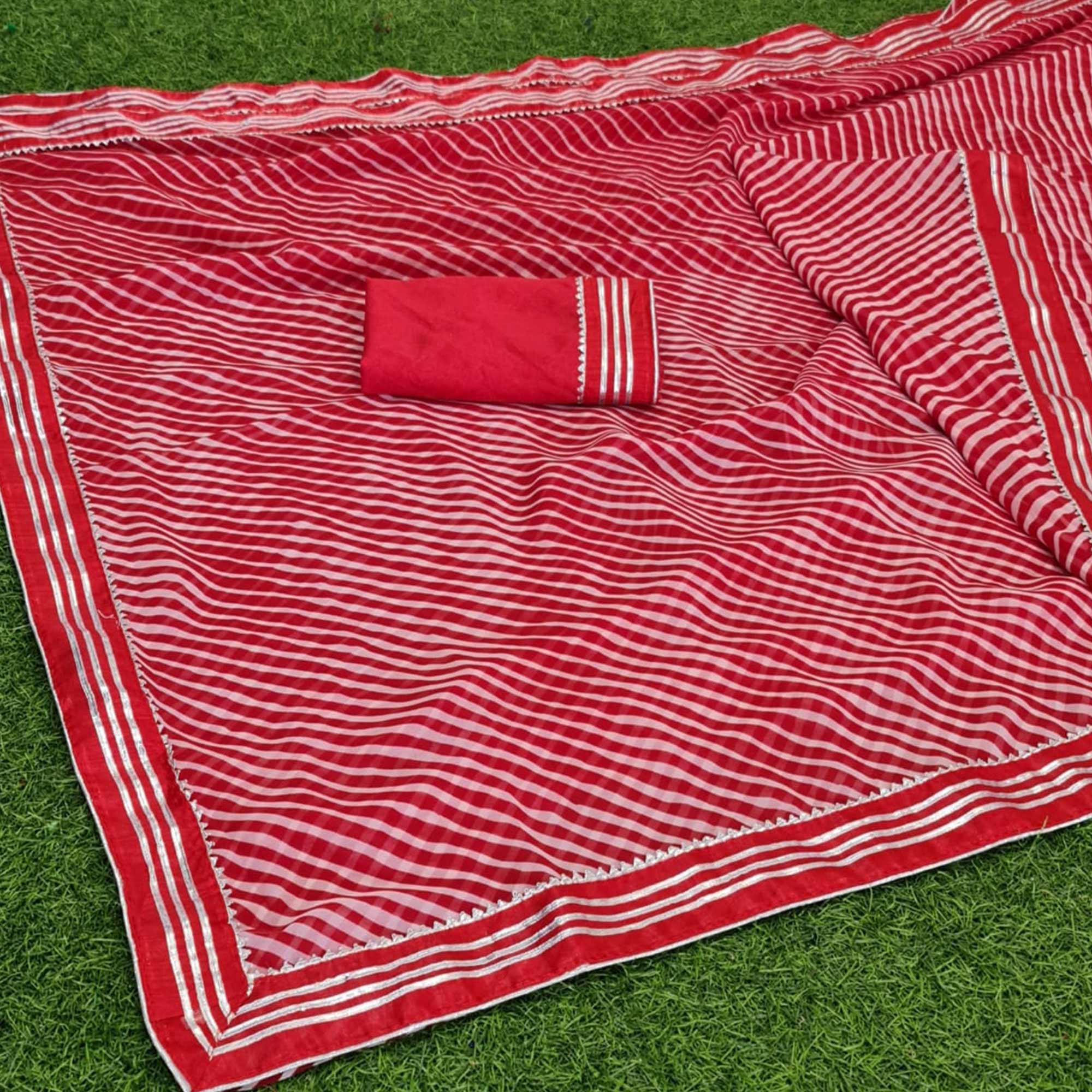 Red Casual Wear Striped Printed Georgette Saree With Gotta Patti Lace Border - Peachmode