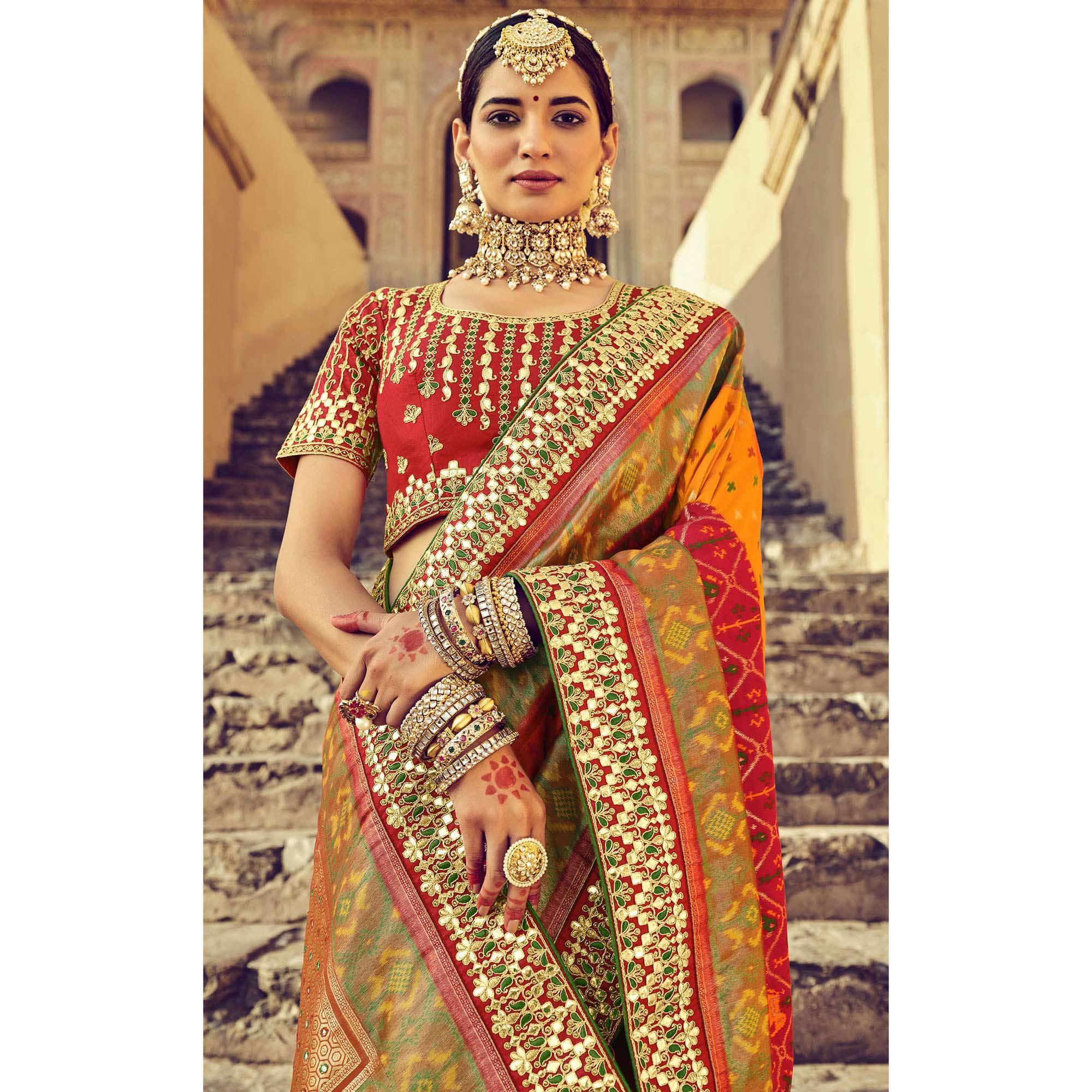 Red Wedding Wear Resham With Embellished Silk Patola Saree - Peachmode